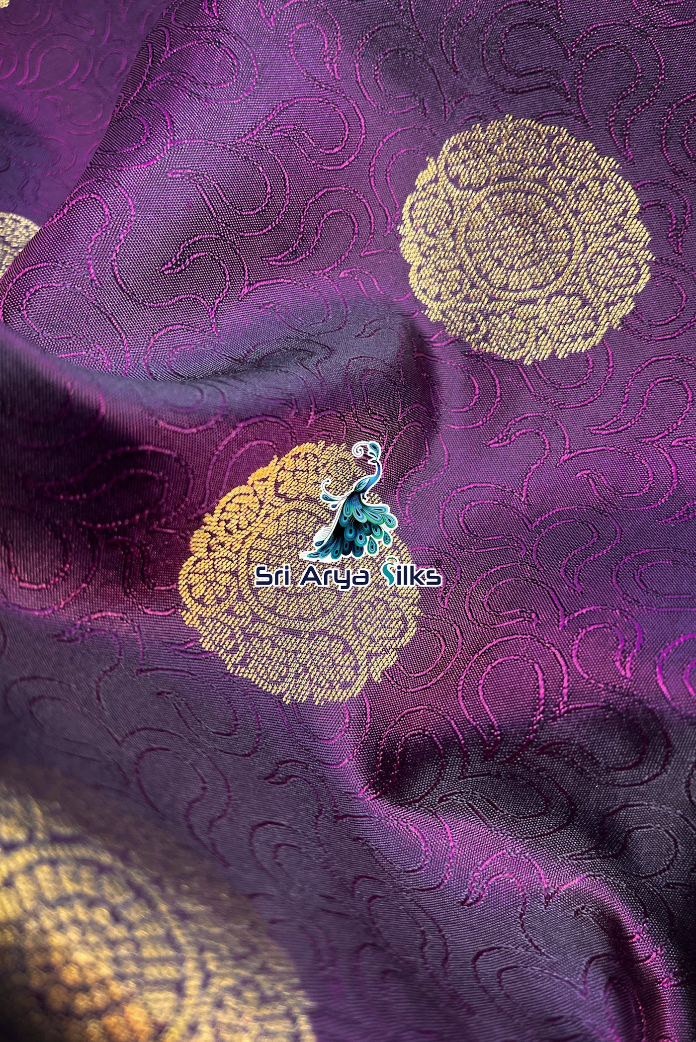 Dual Tone Wine Embosed Saree With Purple Blouse & Buttas Pattern