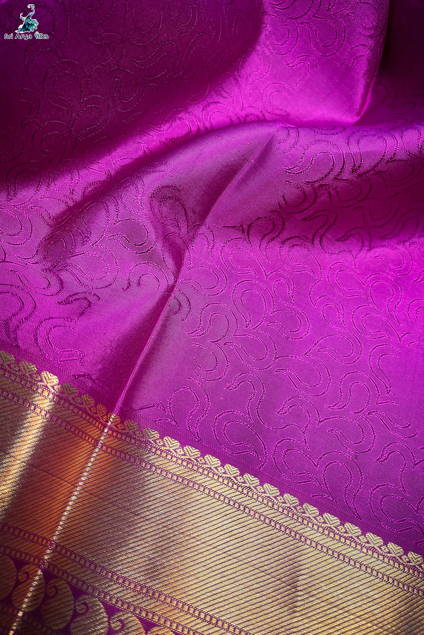 Dual Tone Wine Embosed Saree With Purple Blouse & Buttas Pattern