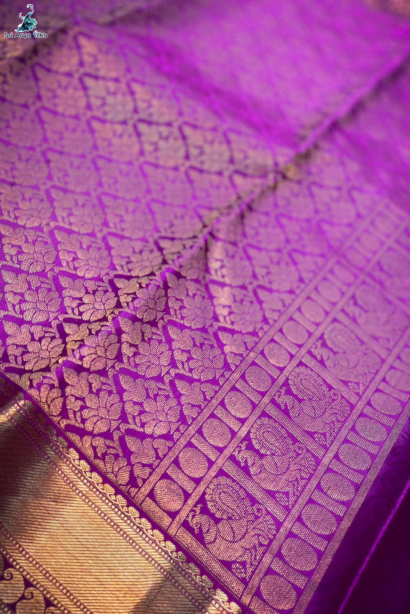 Dual Tone Wine Embosed Saree With Purple Blouse & Buttas Pattern