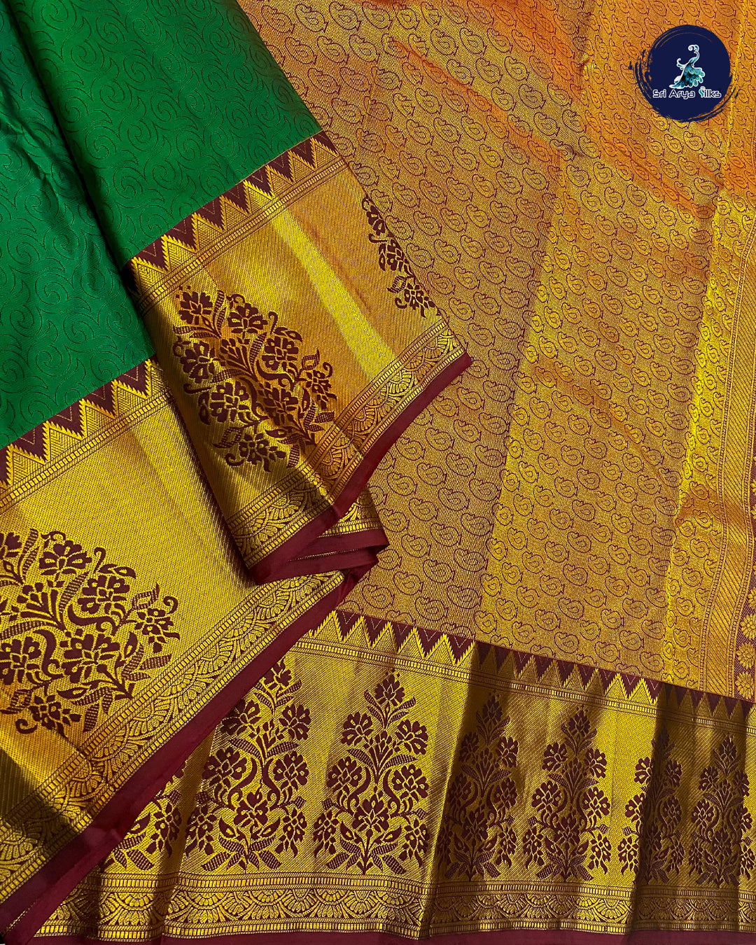 Bottle Green Embosed Saree With Maroon Blouse & Buttas Pattern
