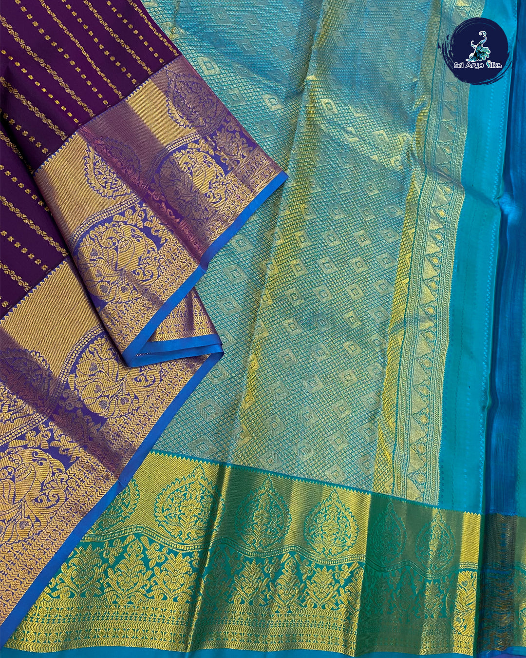 Purple Traditional Silk Saree With Copper Sulphate Blue Blouse & Buttas Pattern