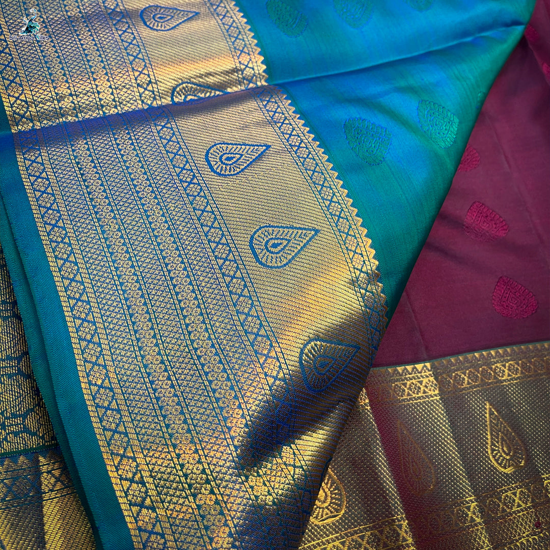 Wine and Teal Blue Kanchipuram silk saree