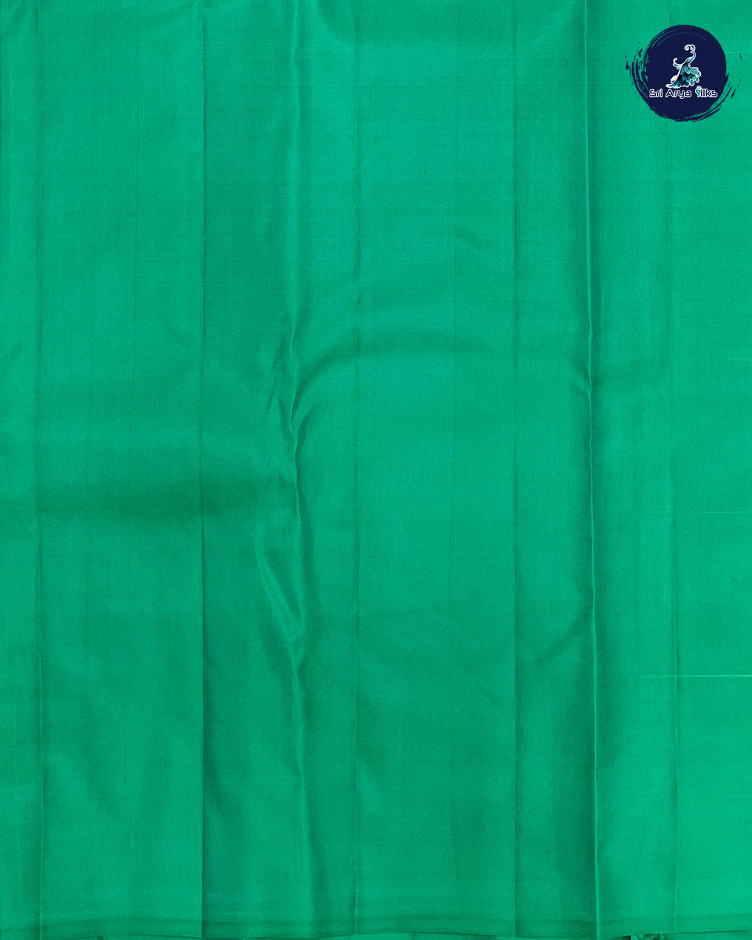 White And Green Brocade Silk Saree With Green Blouse & Buttas Pattern