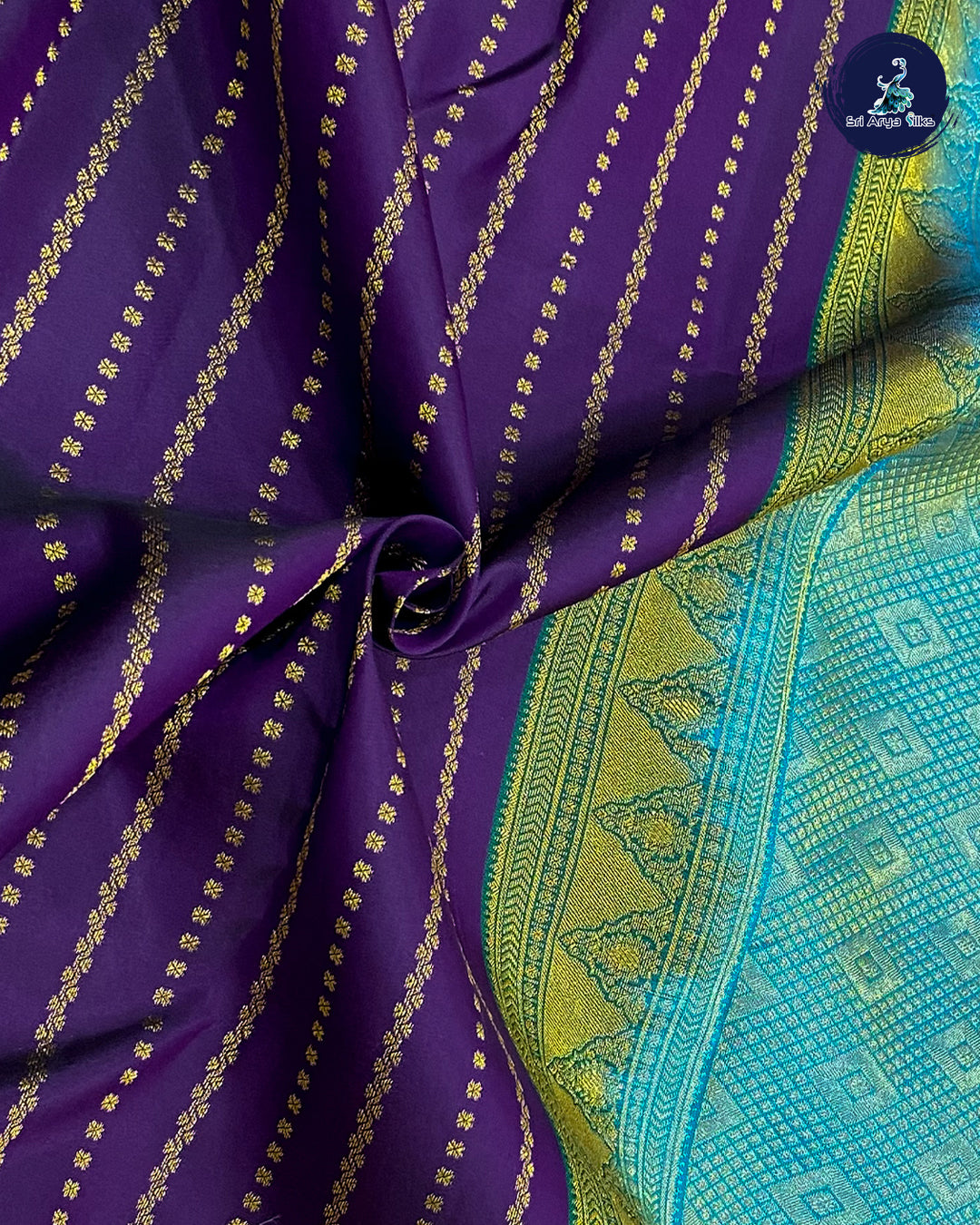 Purple Traditional Silk Saree With Copper Sulphate Blue Blouse & Buttas Pattern