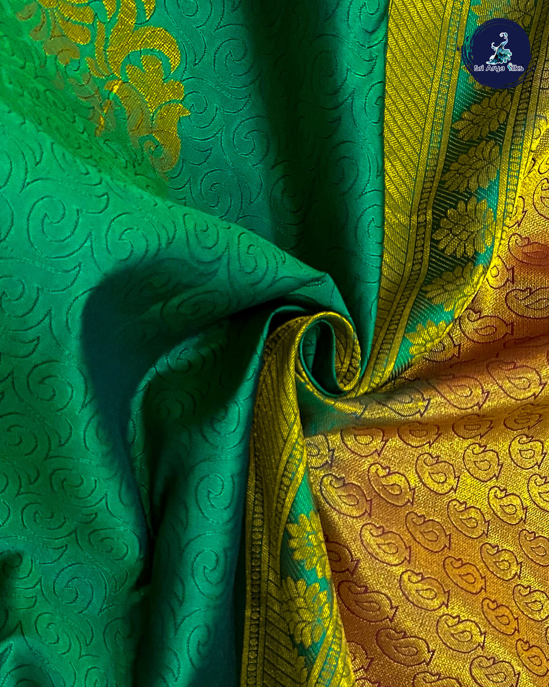 Bottle Green Embosed Saree With Maroon Blouse & Buttas Pattern