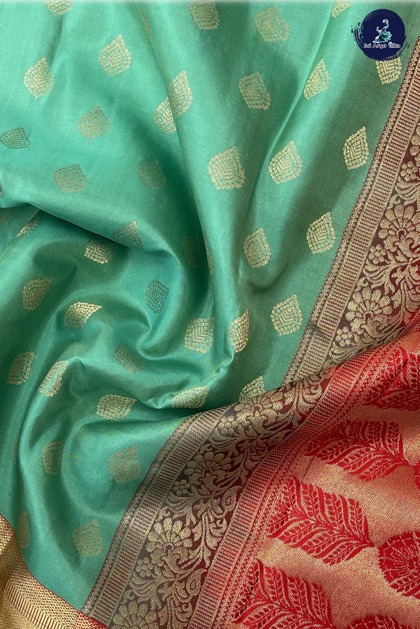 Turquoise Traditional Silk Saree With Red Blouse & Buttas Pattern