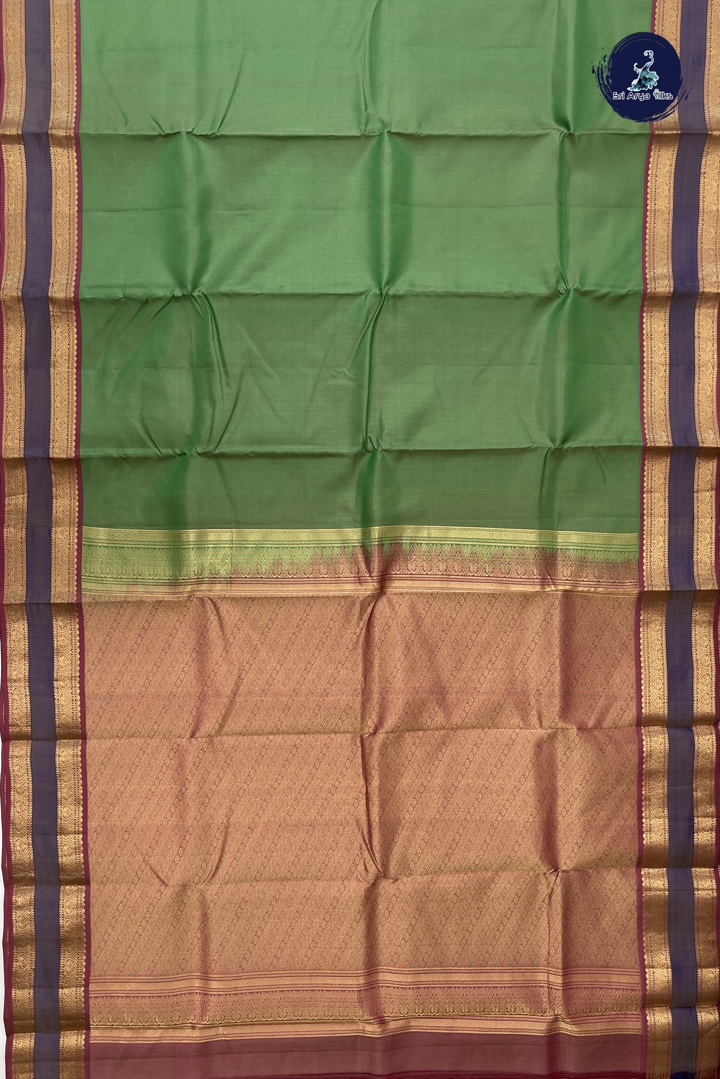Light Green Traditional Silk Saree With Plain Pattern