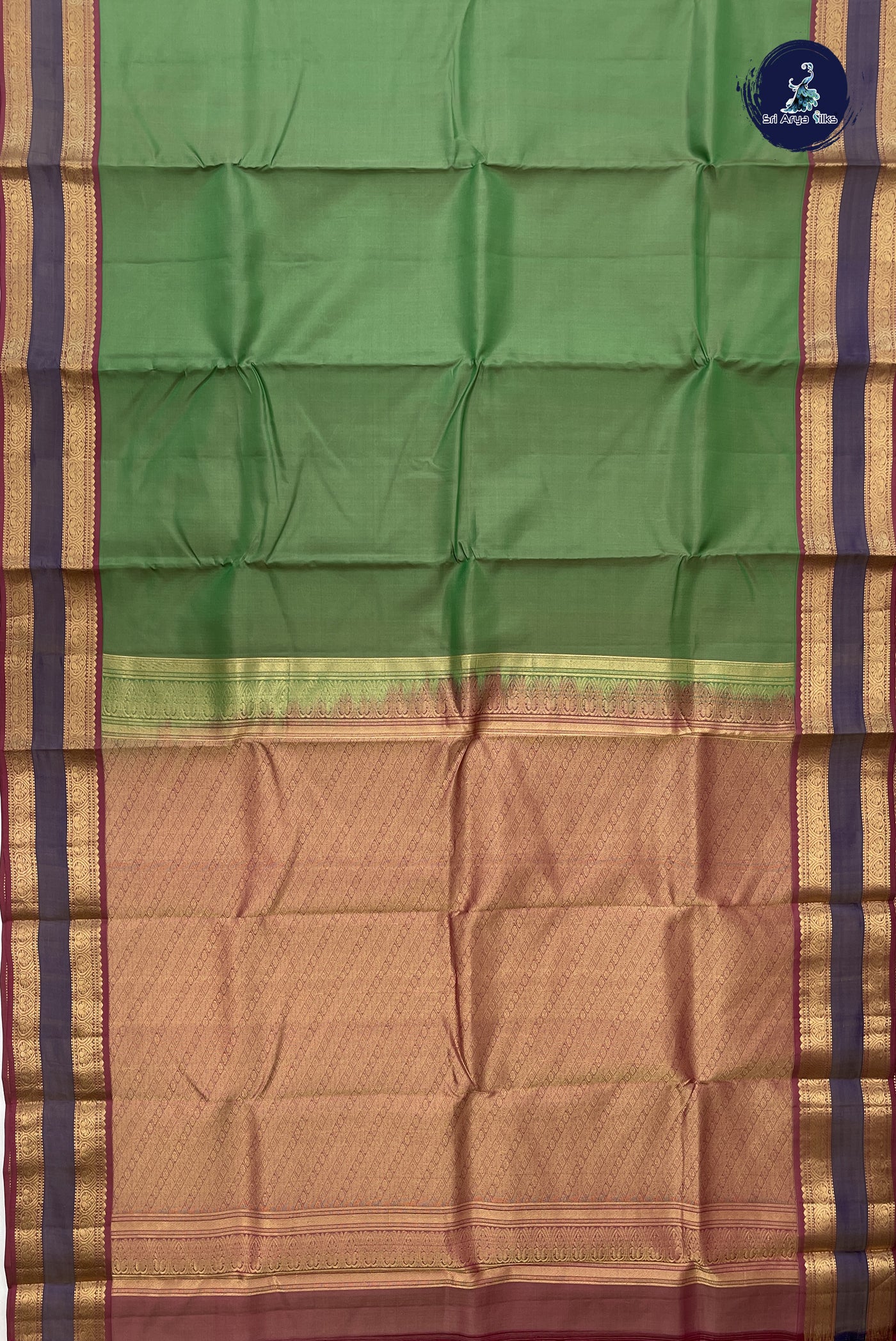 Light Green Silk Saree With Plain Pattern