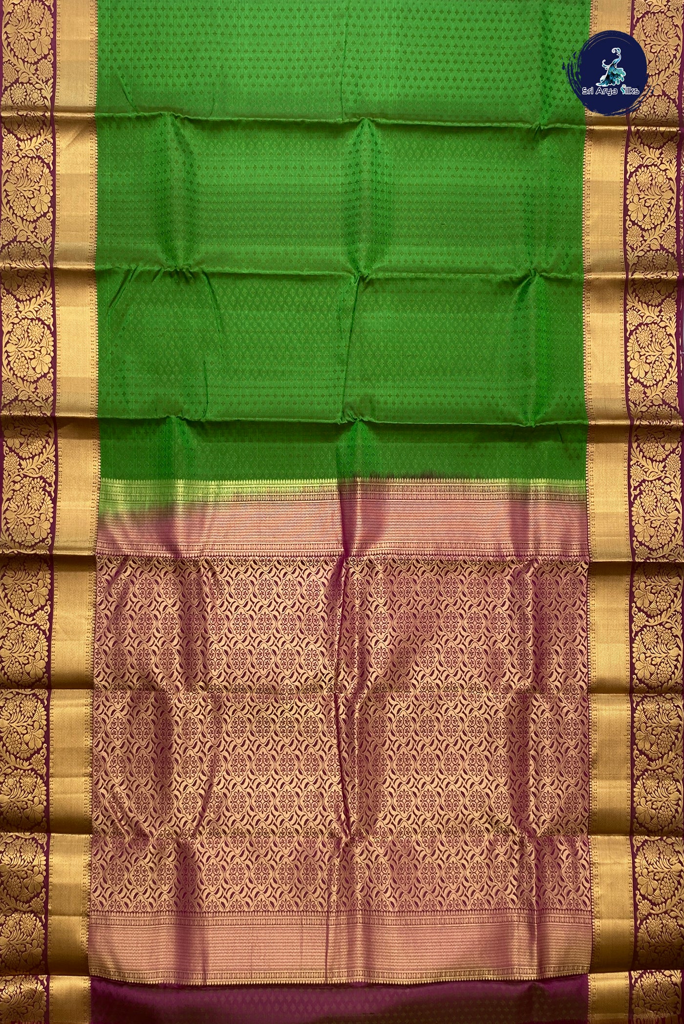 Green Bridal Silk Saree With Embossed Pattern