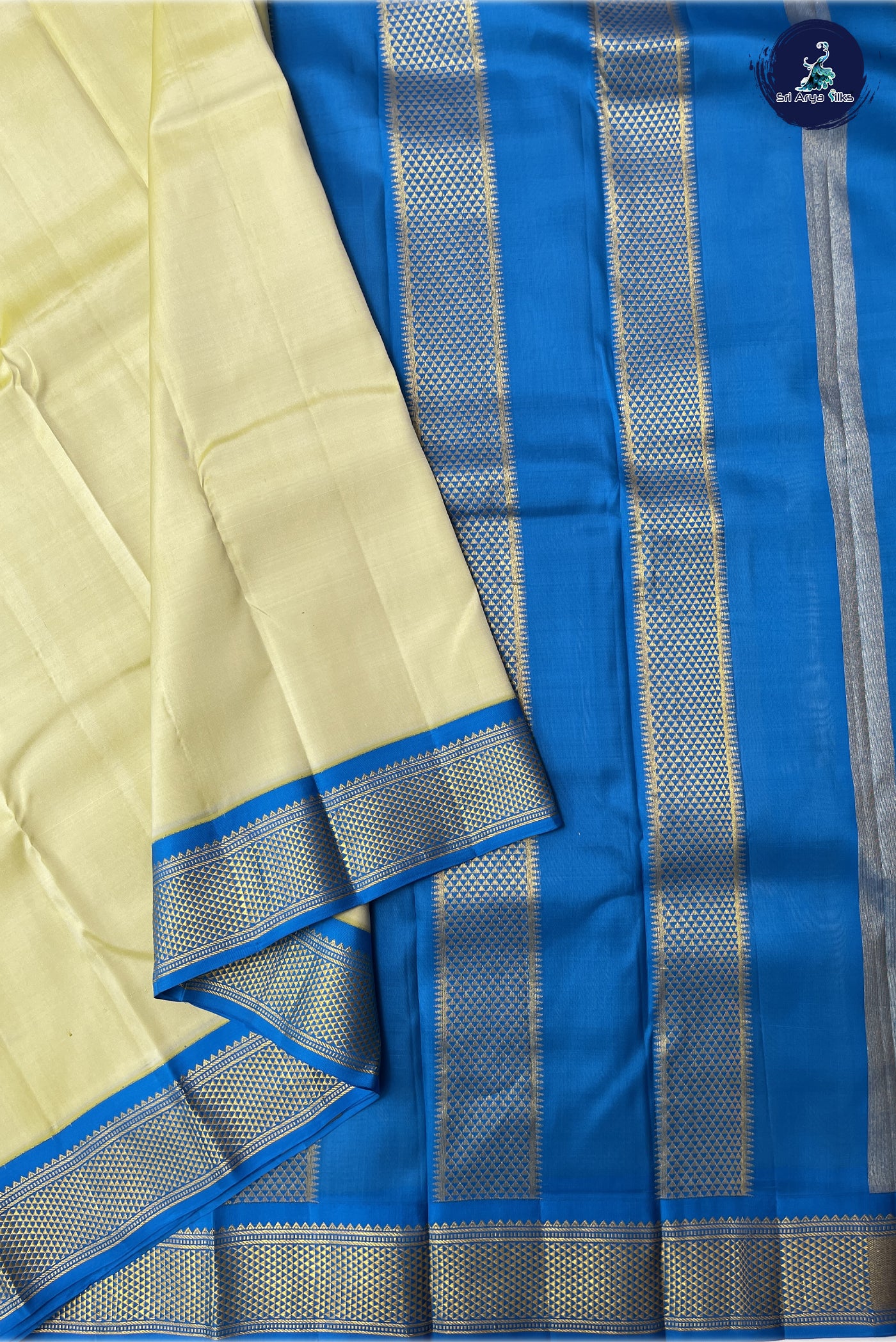 Creamish Yellow Traditional  Silk Saree With Plain Pattern