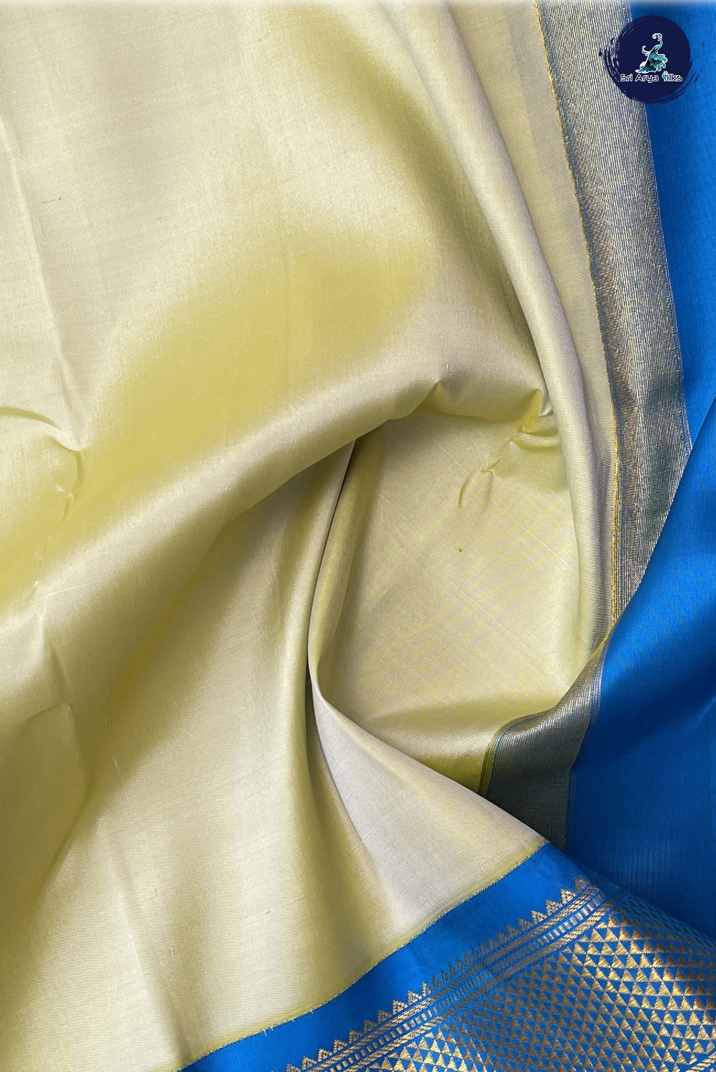 Creamish Yellow Traditional  Silk Saree With Plain Pattern