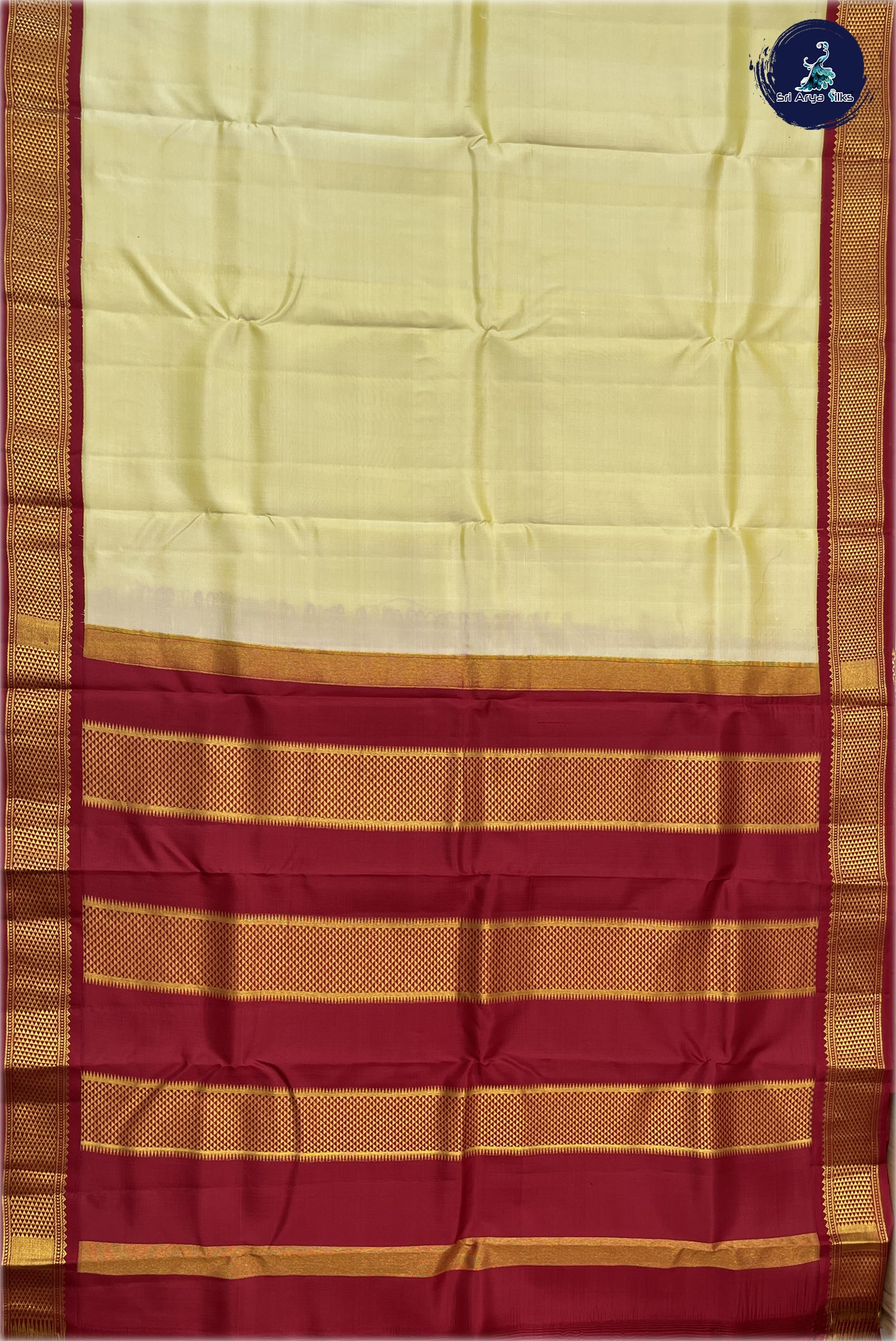 Creamish Yellow Silk Saree With Plain Pattern