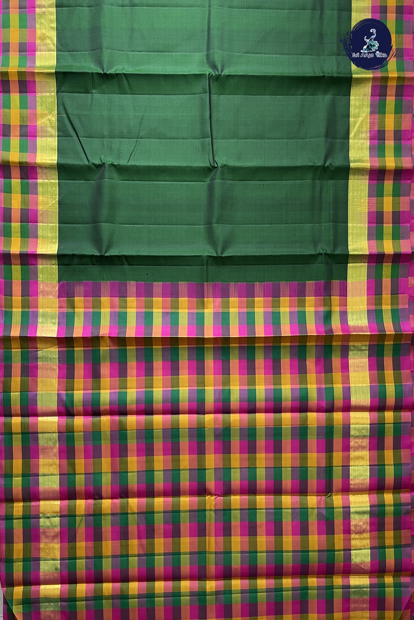 Bottle Green Light Weight Silk Saree With Plain Pattern