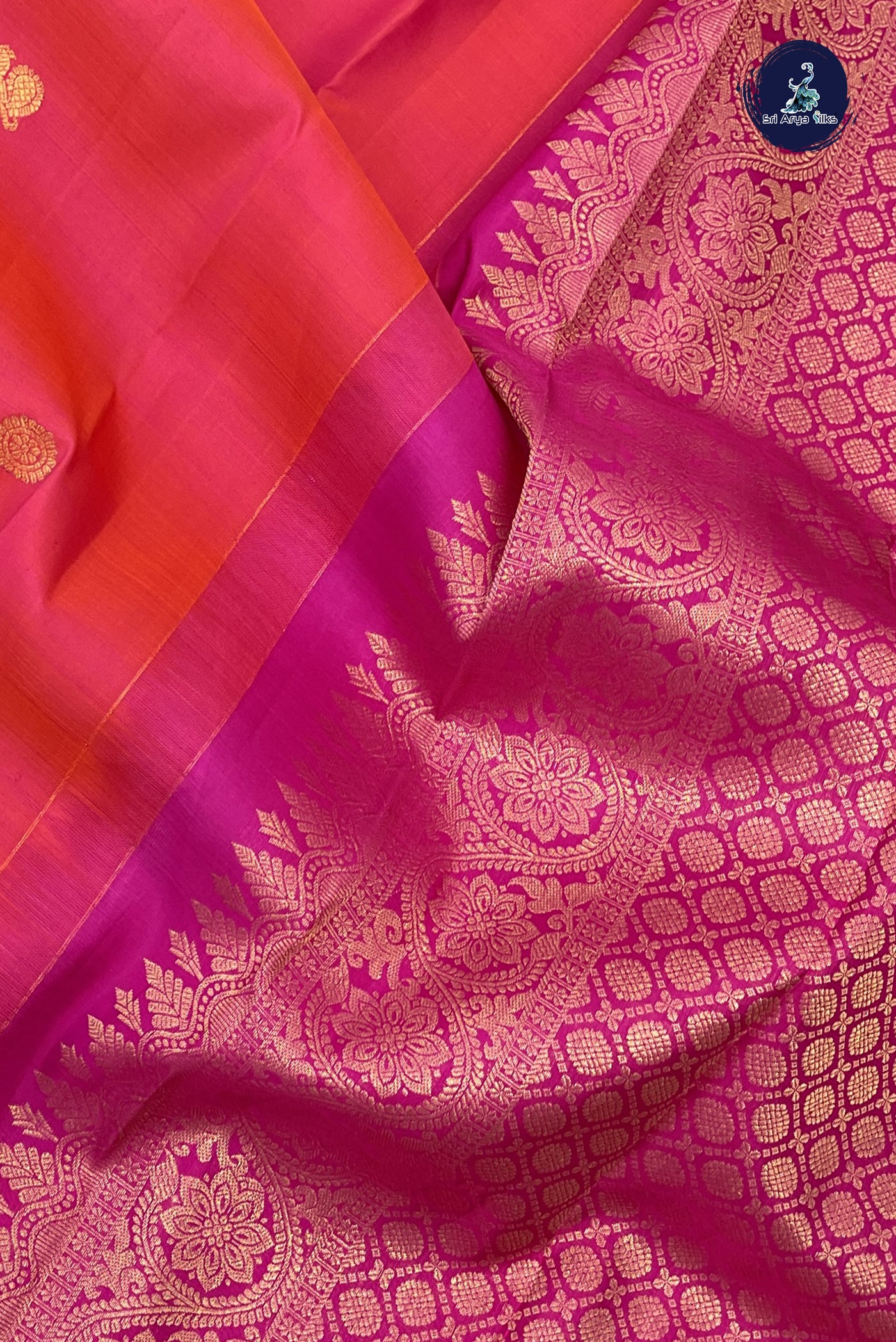 Pinkish Orange Single Side Border Saree With Zari Buttas Pattern