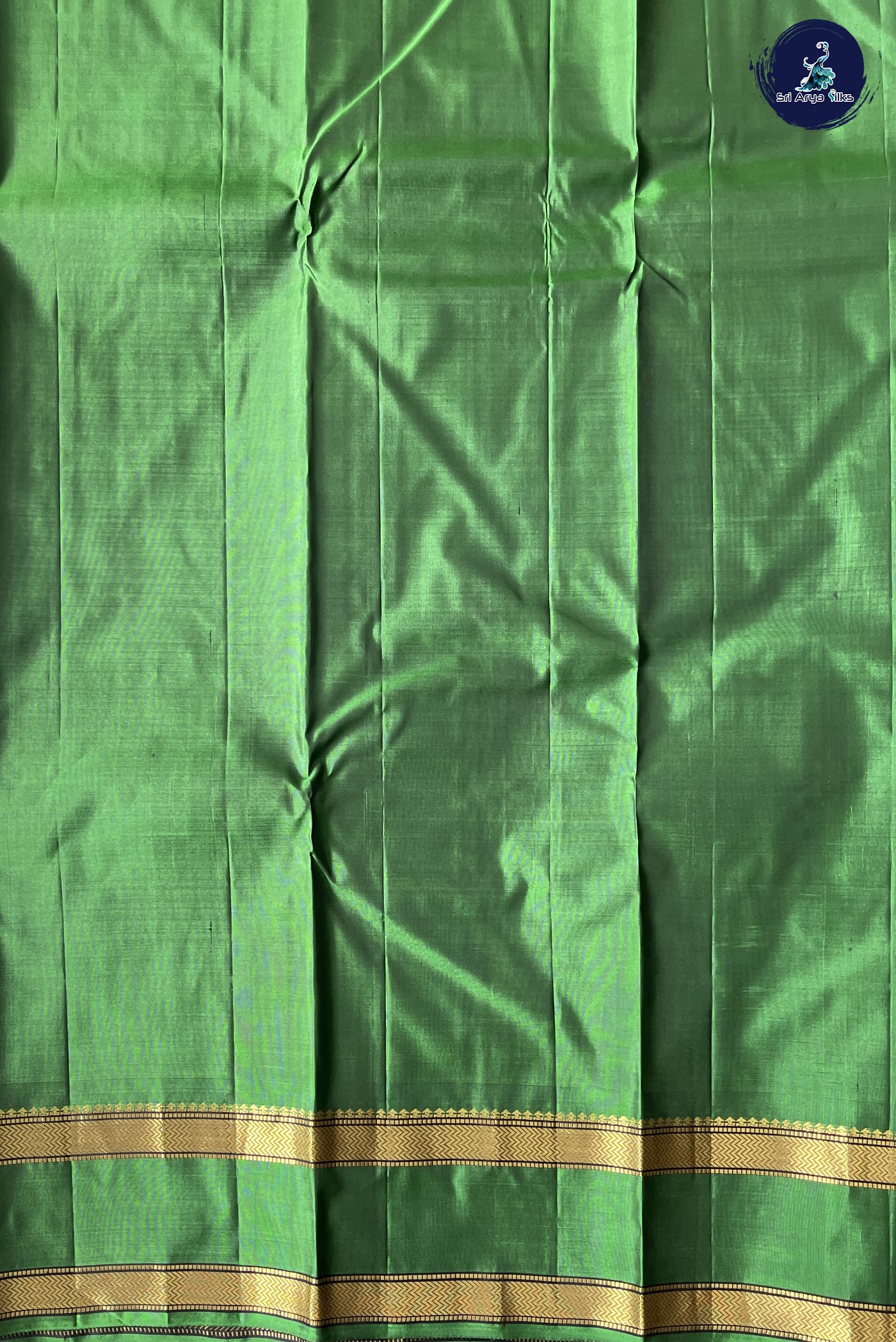 Greenish Grey Light Weight Silk Saree With Plain Pattern