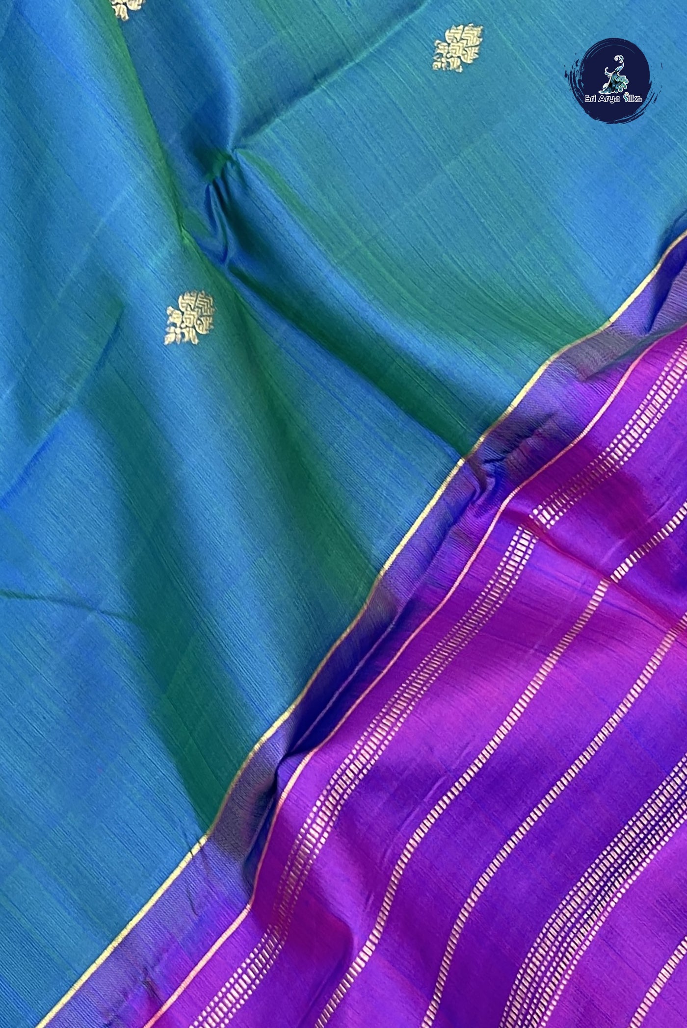 Peacock Blue Bridal Silk Saree With Zari Buttas Pattern