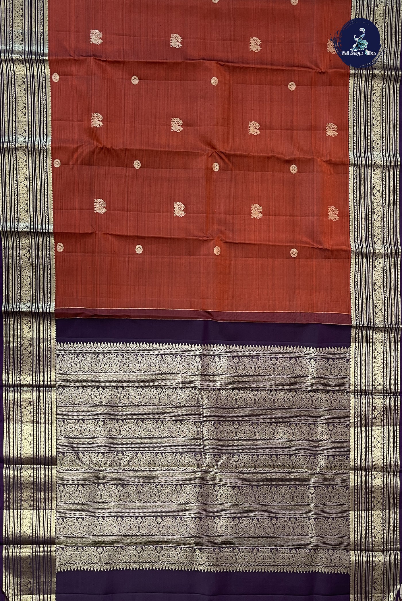 Rust Traditional Silk Saree With Zari Buttas Pattern