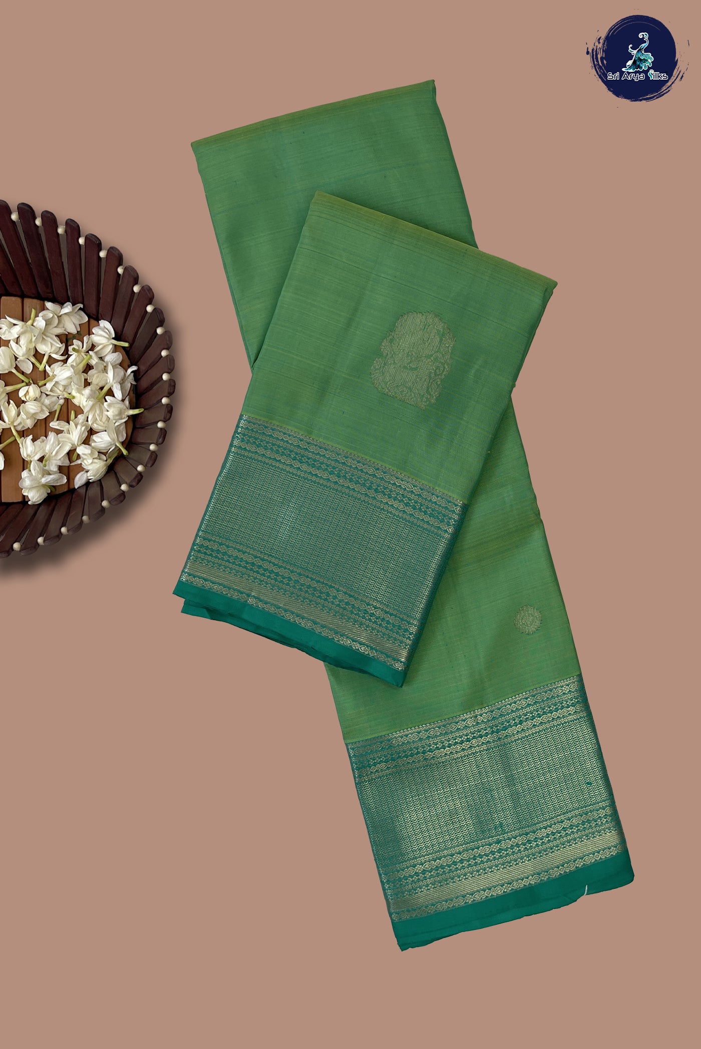 Pastel Green Traditional Silk Saree With Zari Buttas Pattern