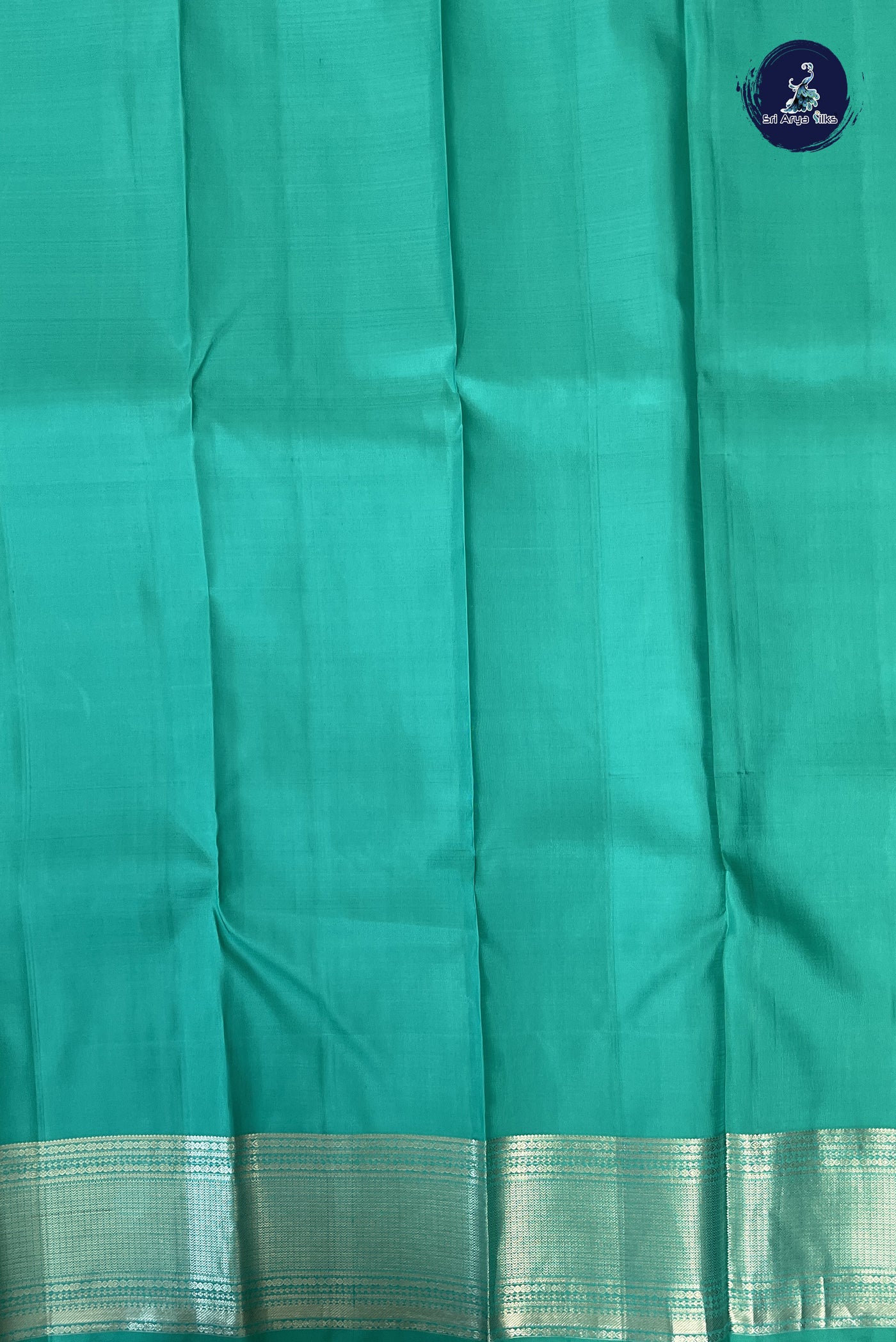 Pastel Green Traditional Silk Saree With Zari Buttas Pattern