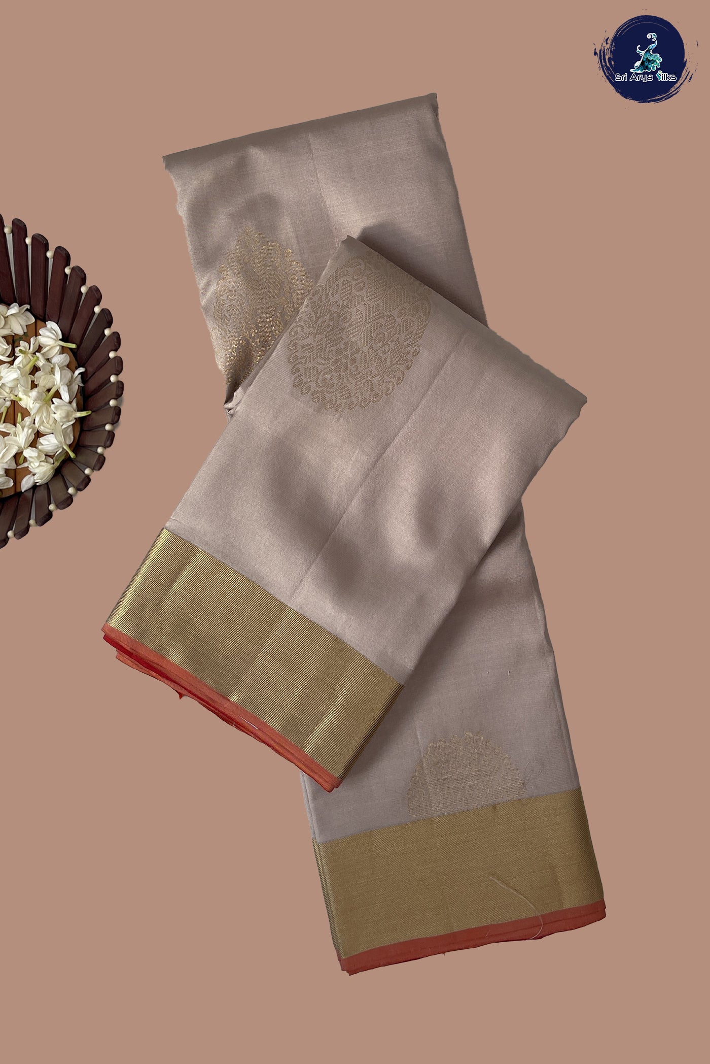 Beige Soft Silk Saree With Zari Buttas Pattern