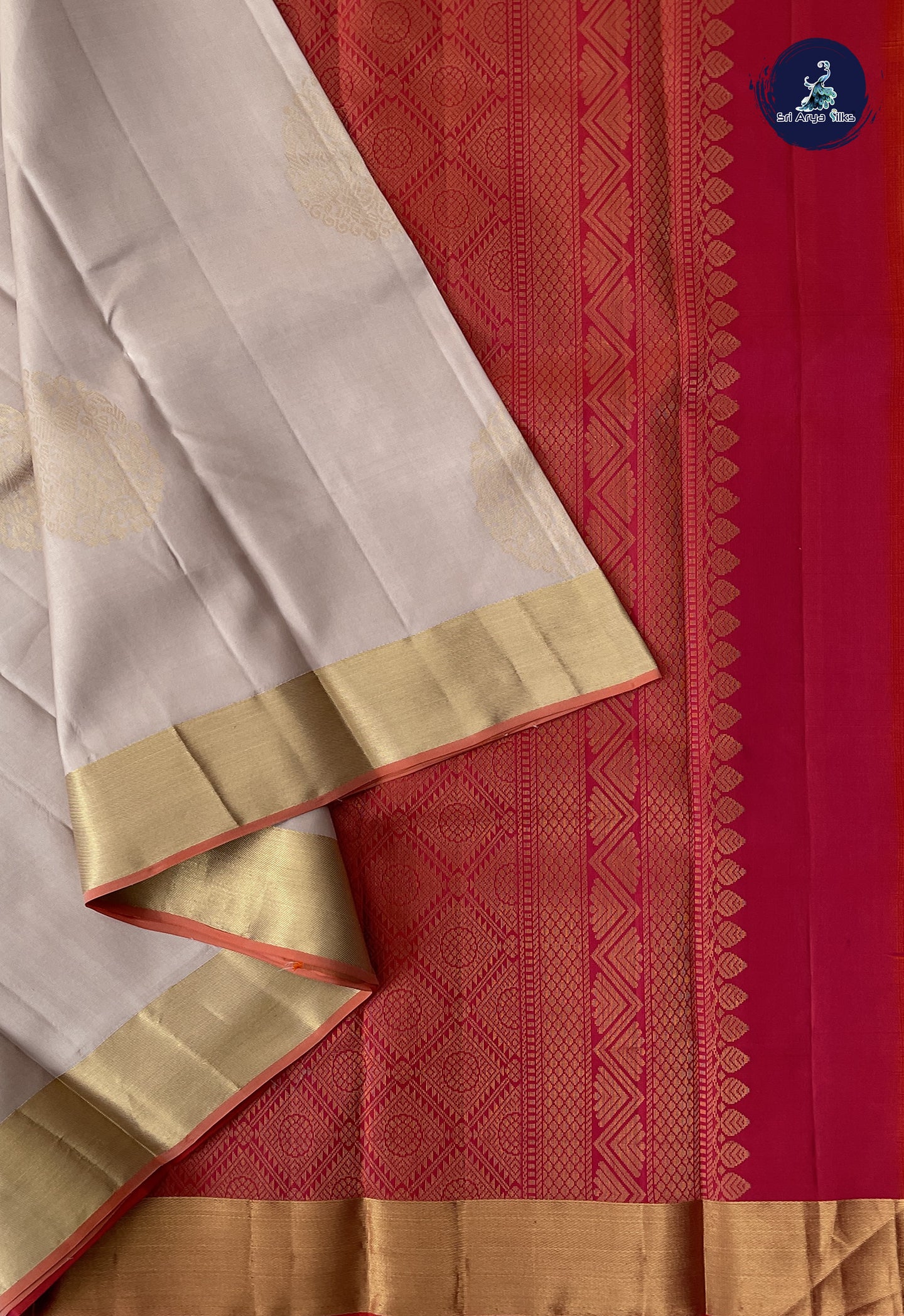 Beige Soft Silk Saree With Zari Buttas Pattern