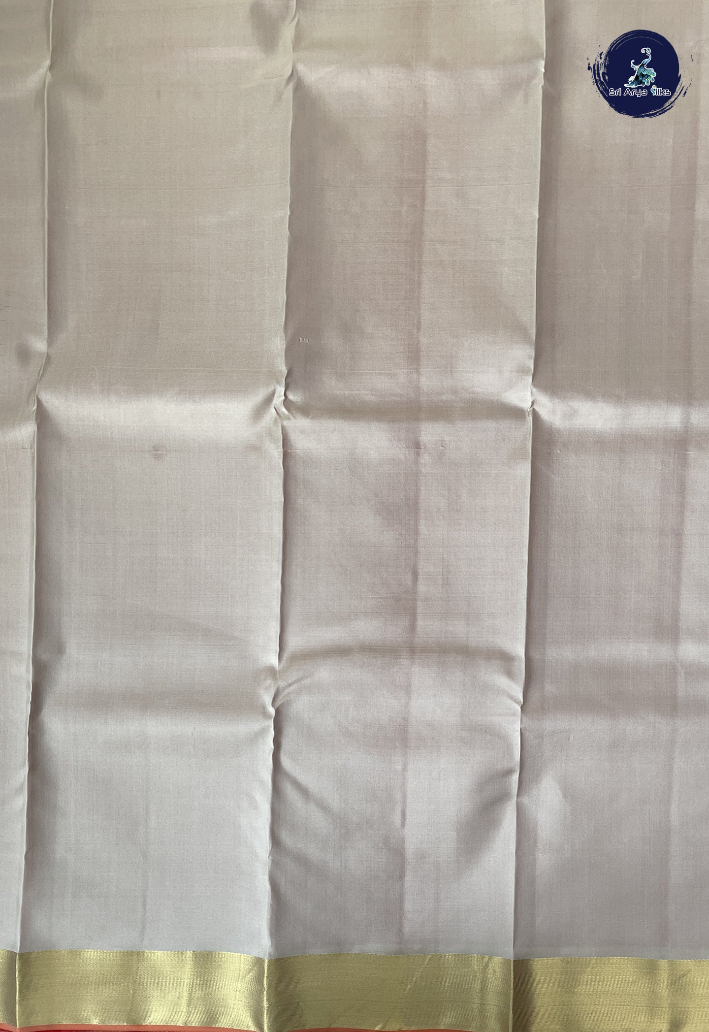 Beige Soft Silk Saree With Zari Buttas Pattern