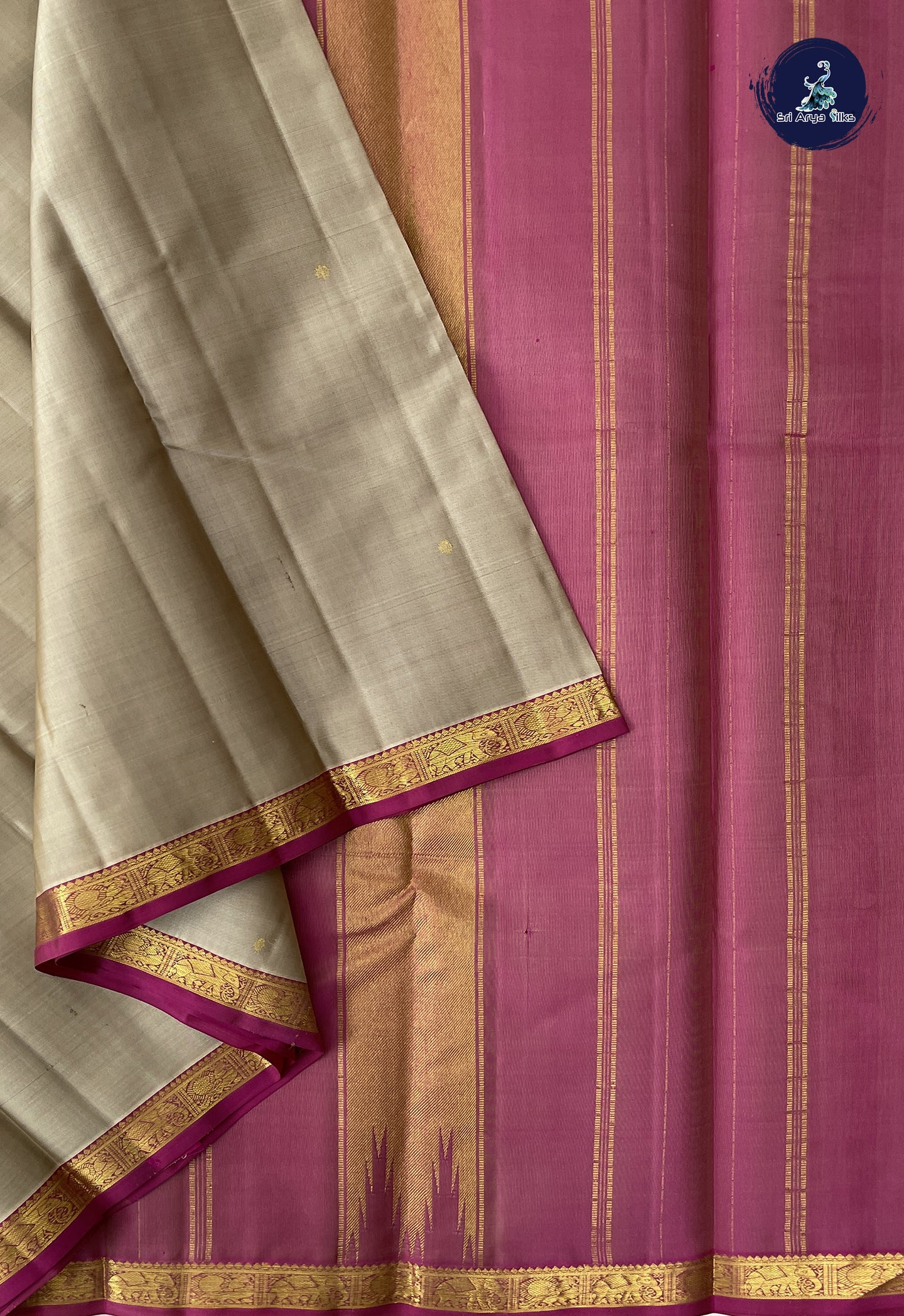 Beige Traditional Silk Saree With Zari Buttas Pattern