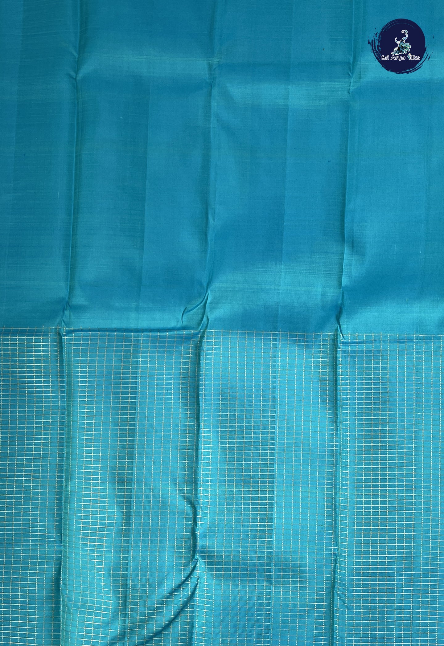 Pastel Green Half and Half Checked Silk Saree With Zari Buttas Pattern