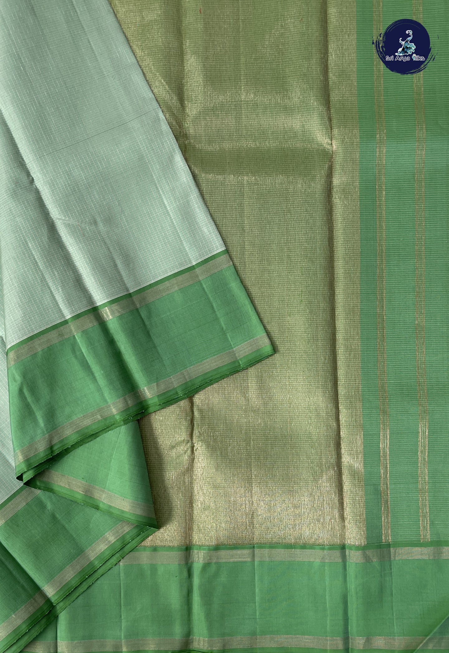Pastel Green Checked Saree With Zari Checked Pattern