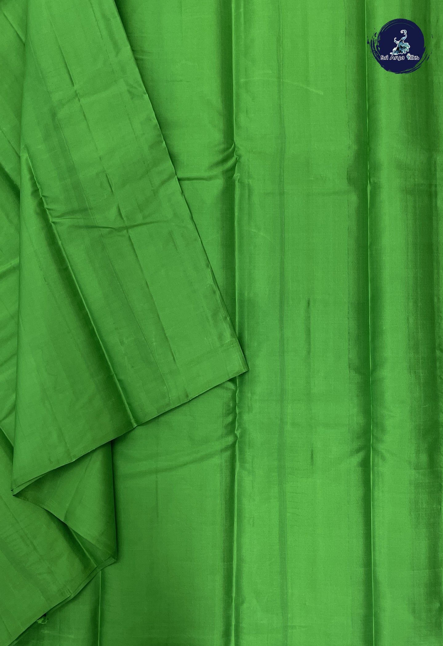 Parrot Green Light Weight Silk Saree With Plain Pattern