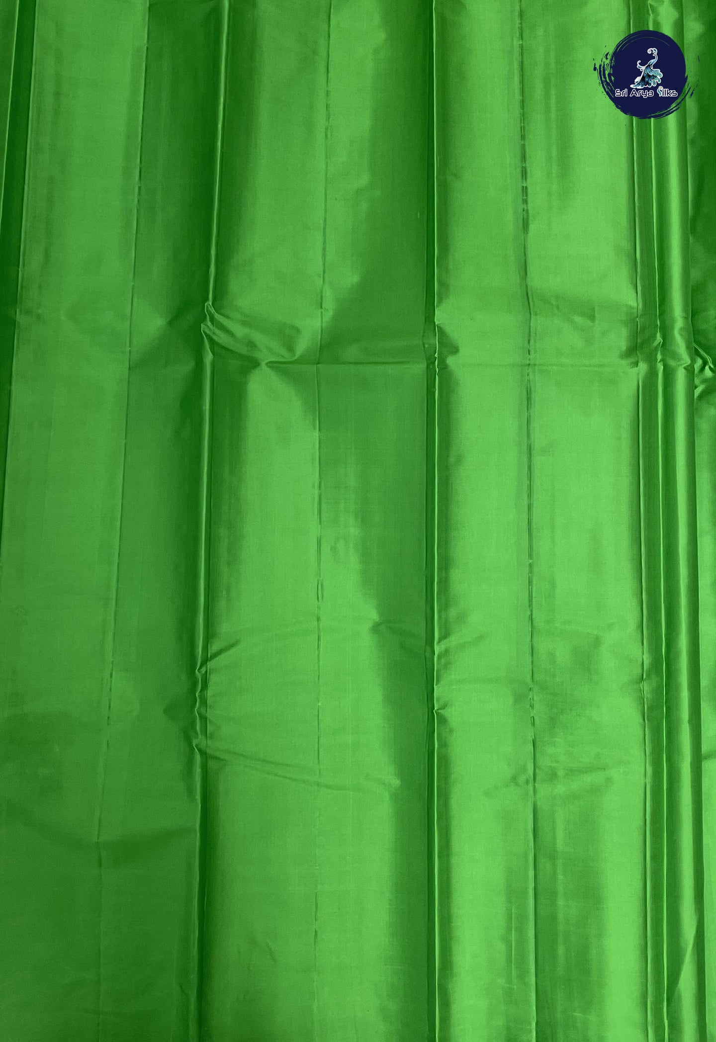 Parrot Green Light Weight Silk Saree With Plain Pattern