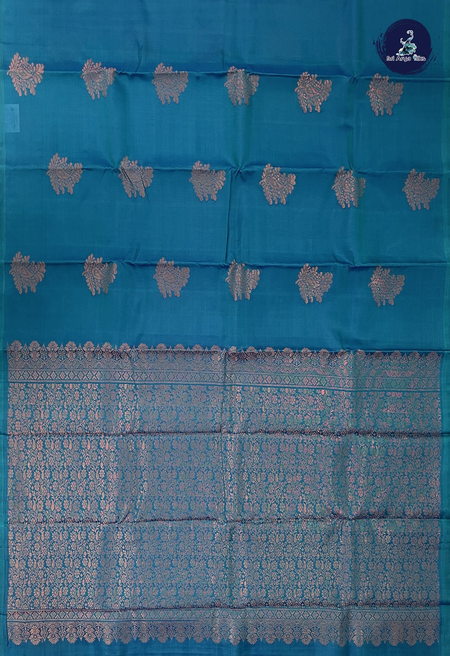 Peacock Blue Soft Silk Saree With Zari Buttas Pattern