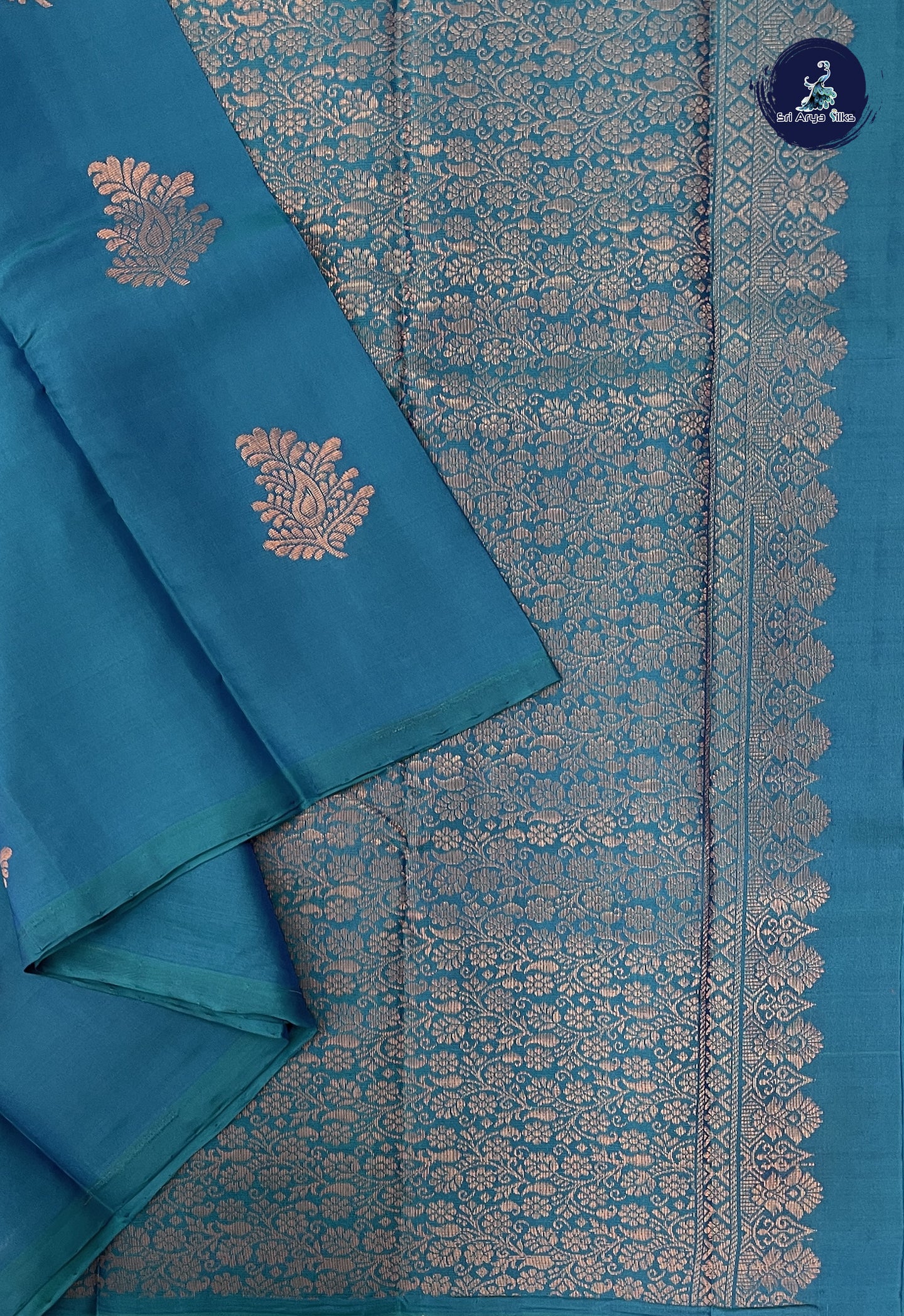 Peacock Blue Soft Silk Saree With Zari Buttas Pattern