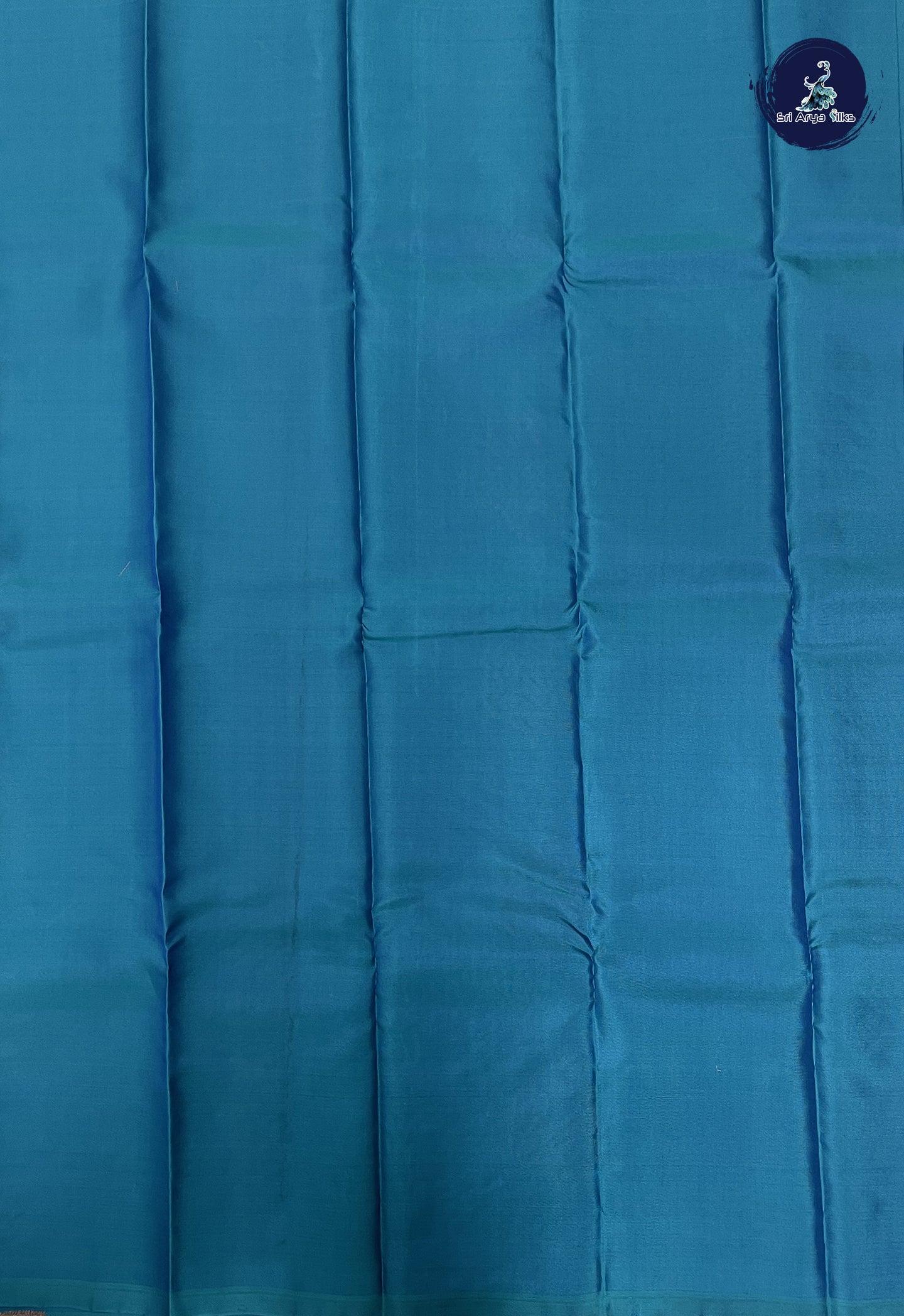 Peacock Blue Soft Silk Saree With Zari Buttas Pattern
