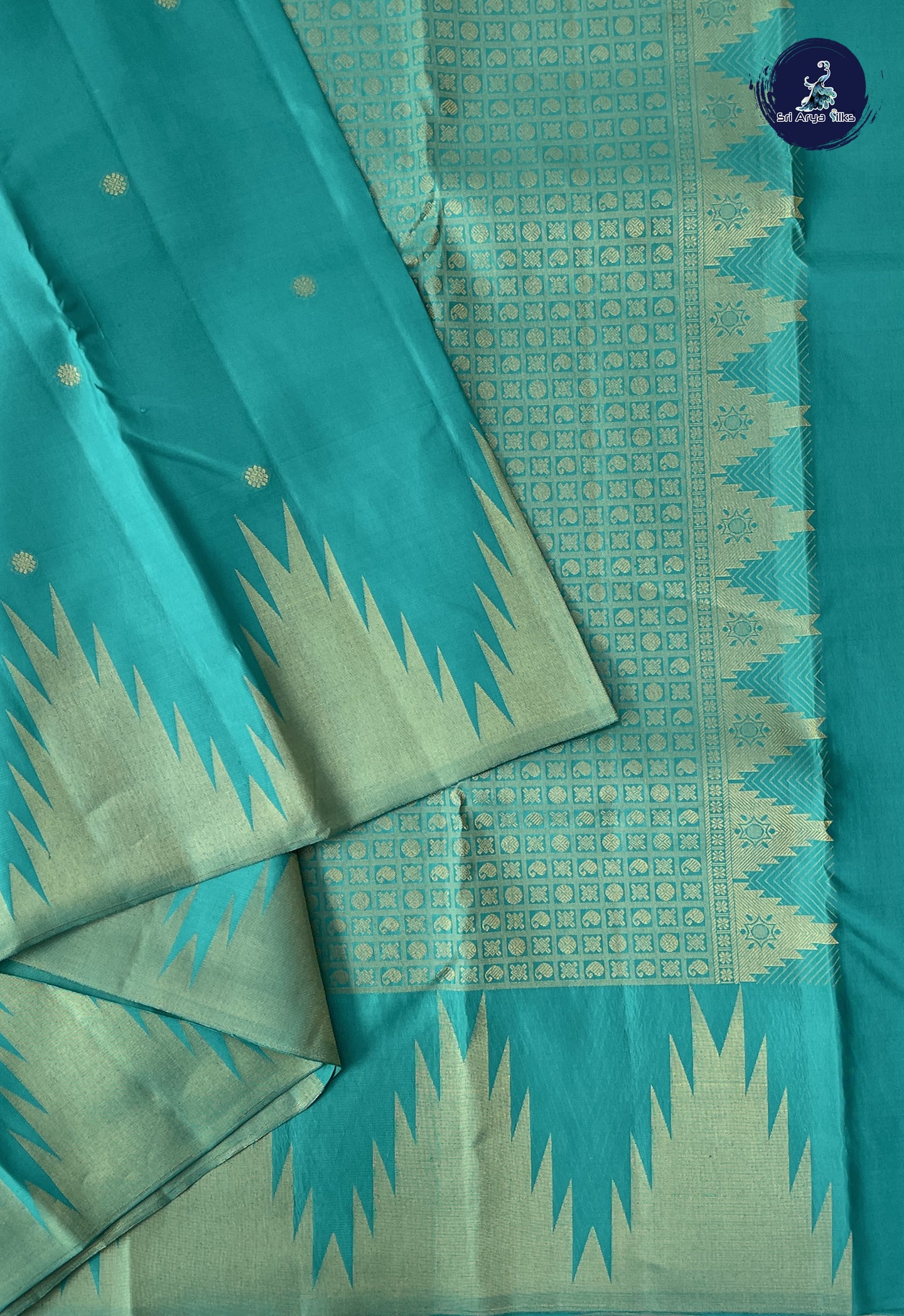Turquoise Traditional Silk Saree With Zari Buttas Pattern