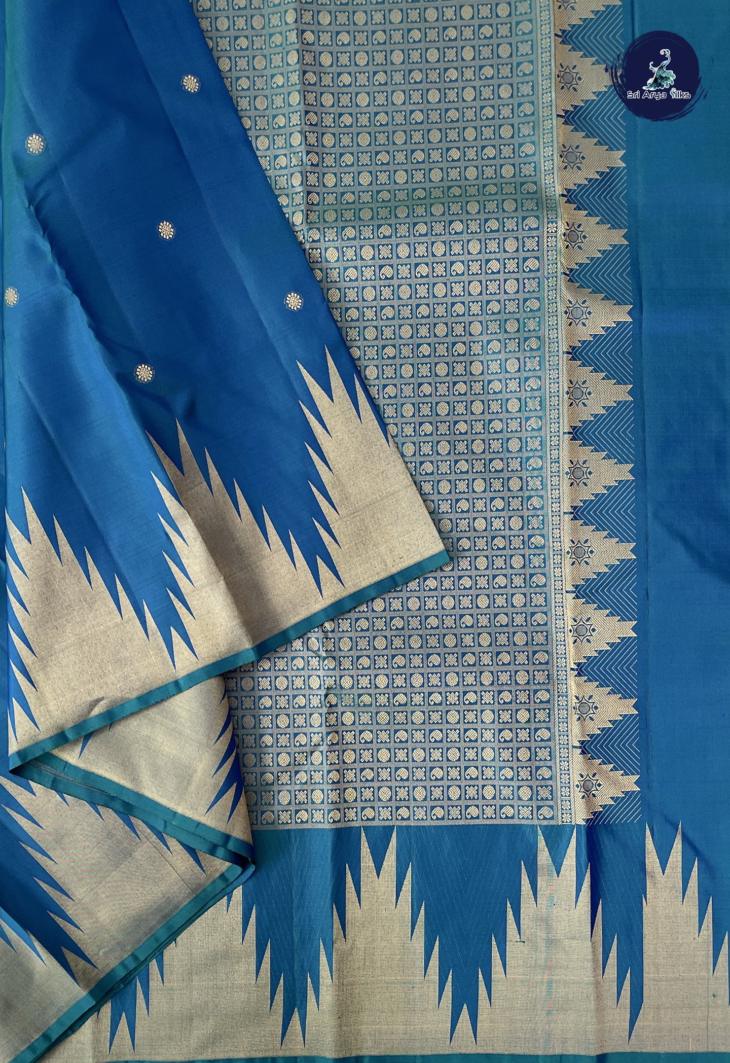 Peacock Blue Traditional Silk Saree With Zari Buttas Pattern