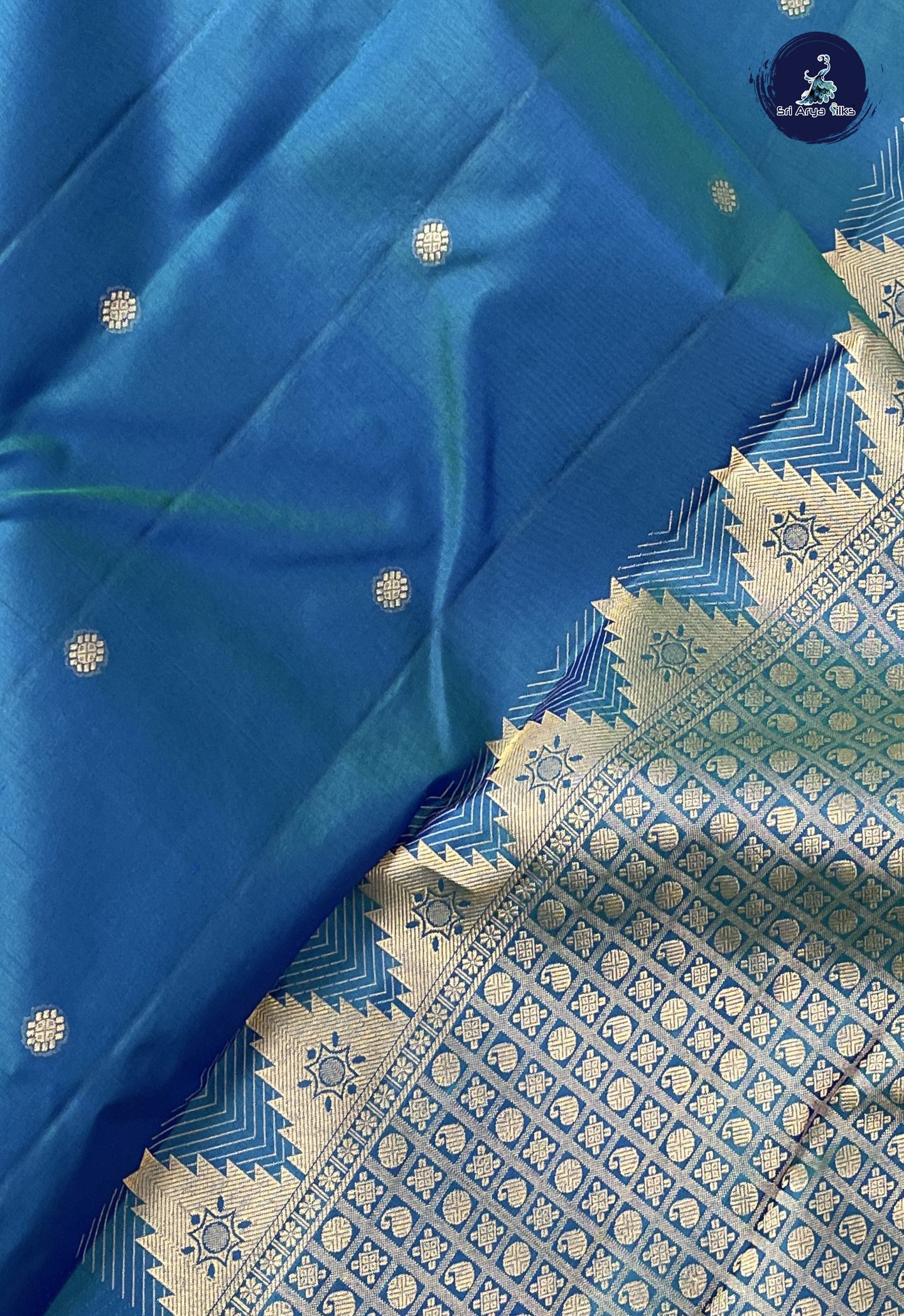 Peacock Blue Traditional Silk Saree With Zari Buttas Pattern