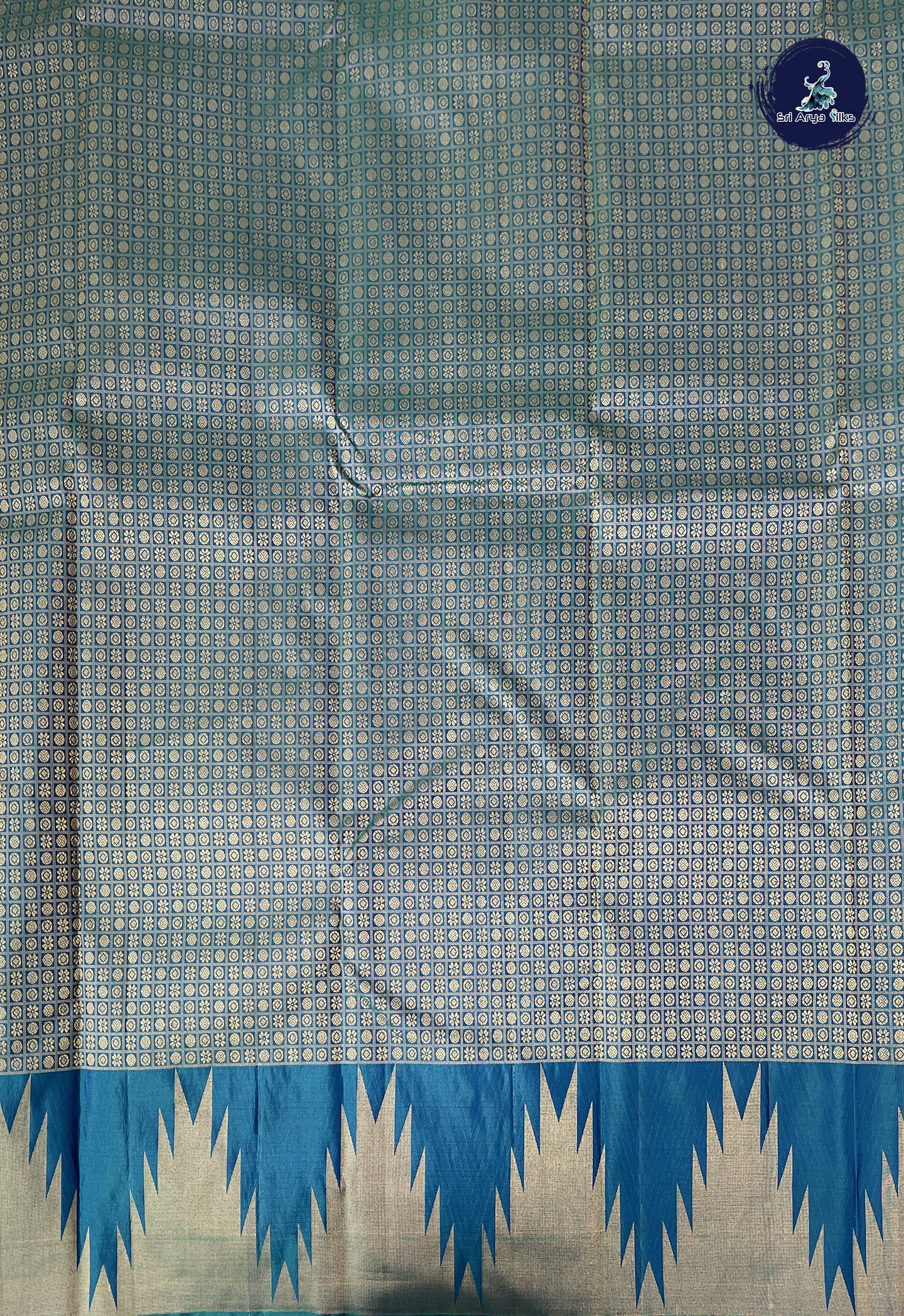 Peacock Blue Traditional Silk Saree With Zari Buttas Pattern