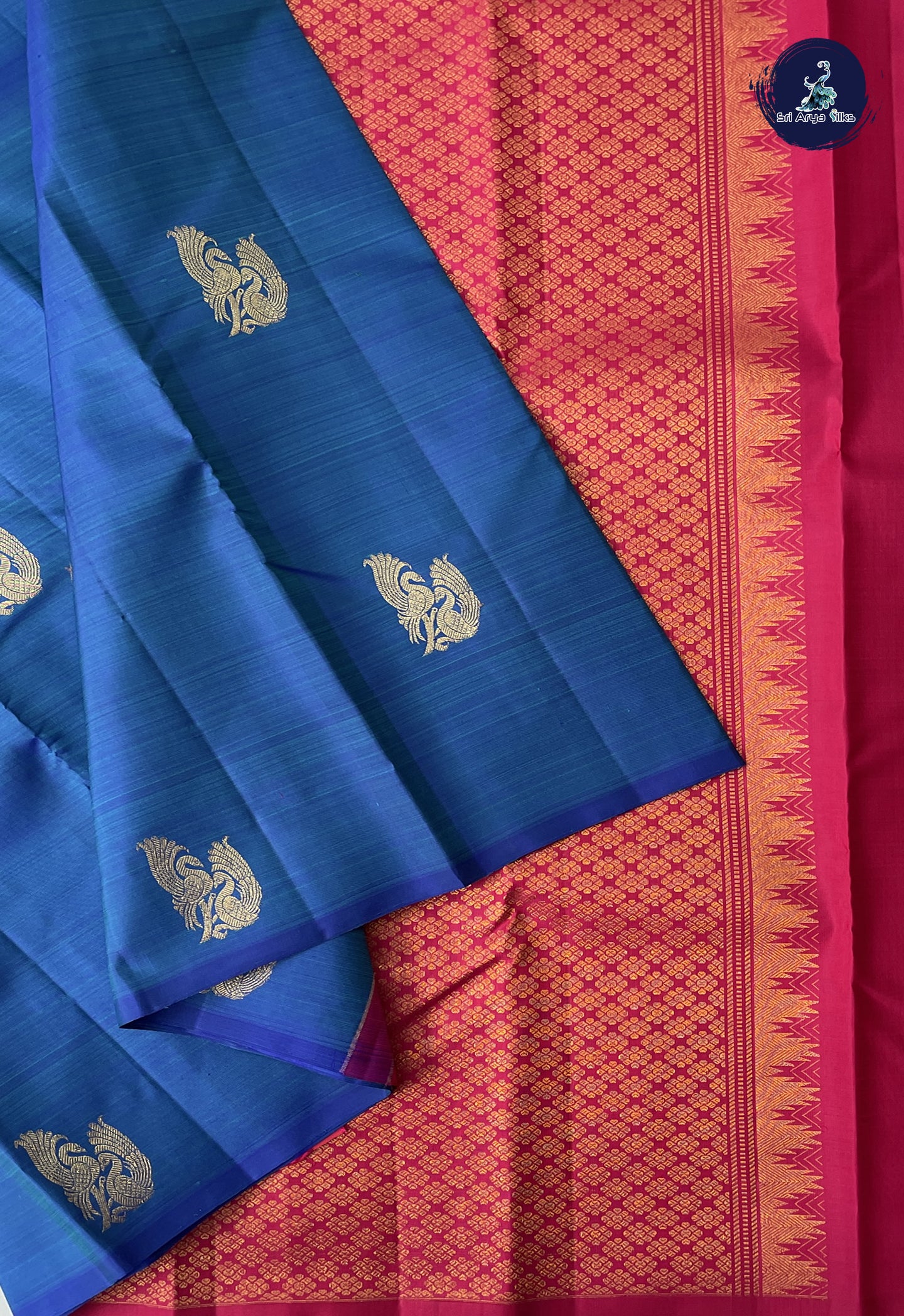Peacock Blue Without Border Saree With Zari Buttas Pattern