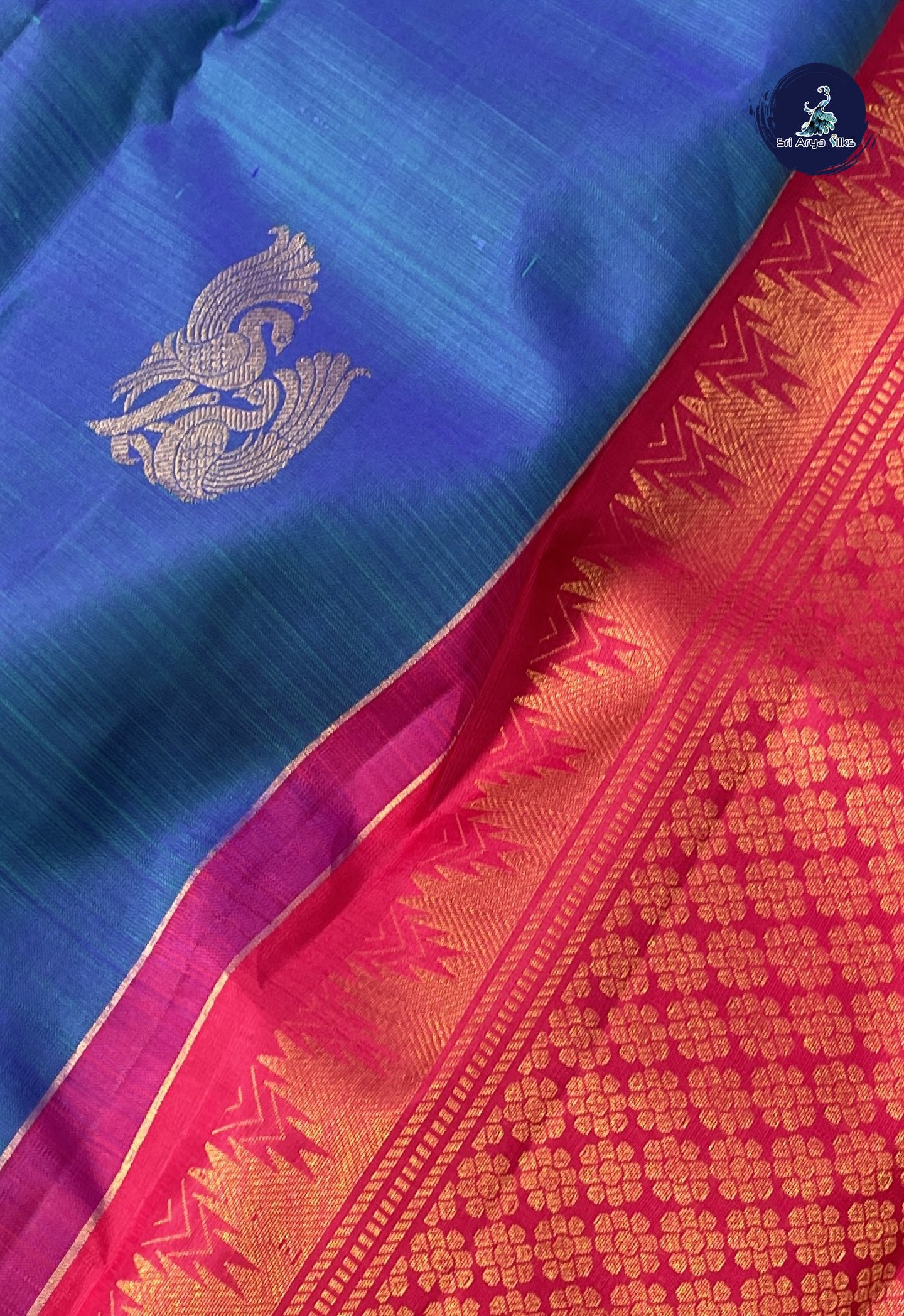 Peacock Blue Without Border Saree With Zari Buttas Pattern