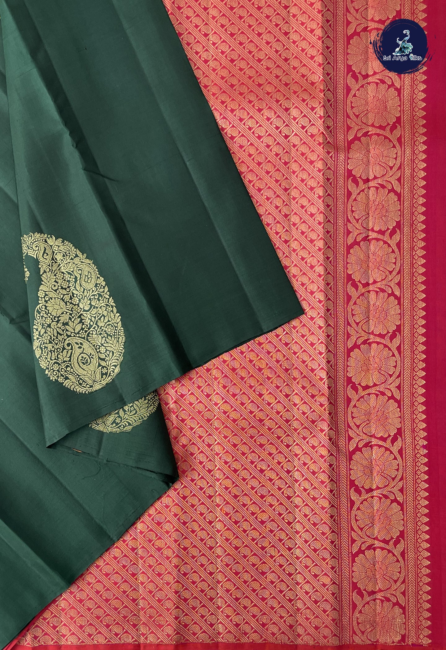 Bottle Green Without Border Saree With Zari Buttas Pattern