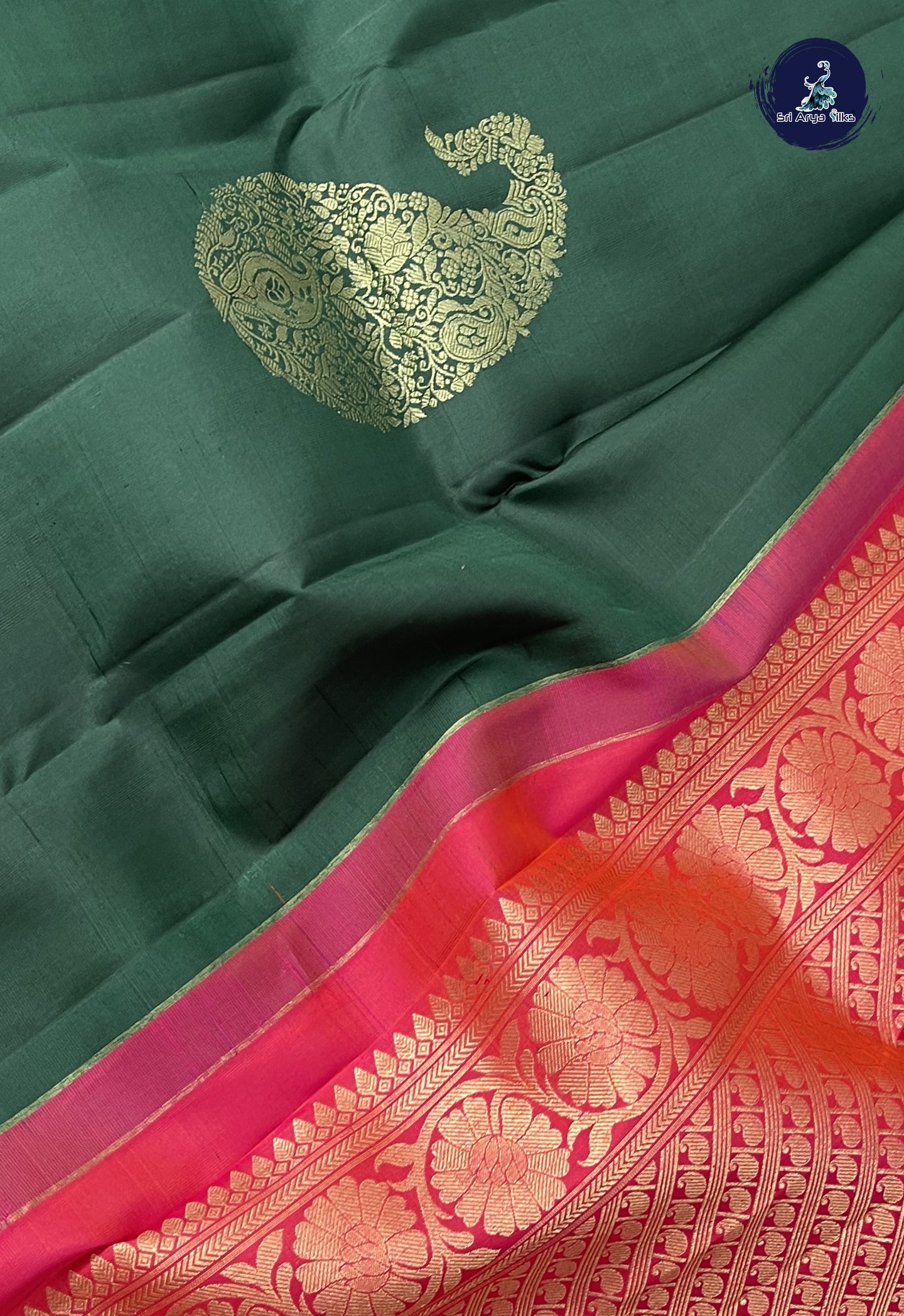 Bottle Green Without Border Saree With Zari Buttas Pattern