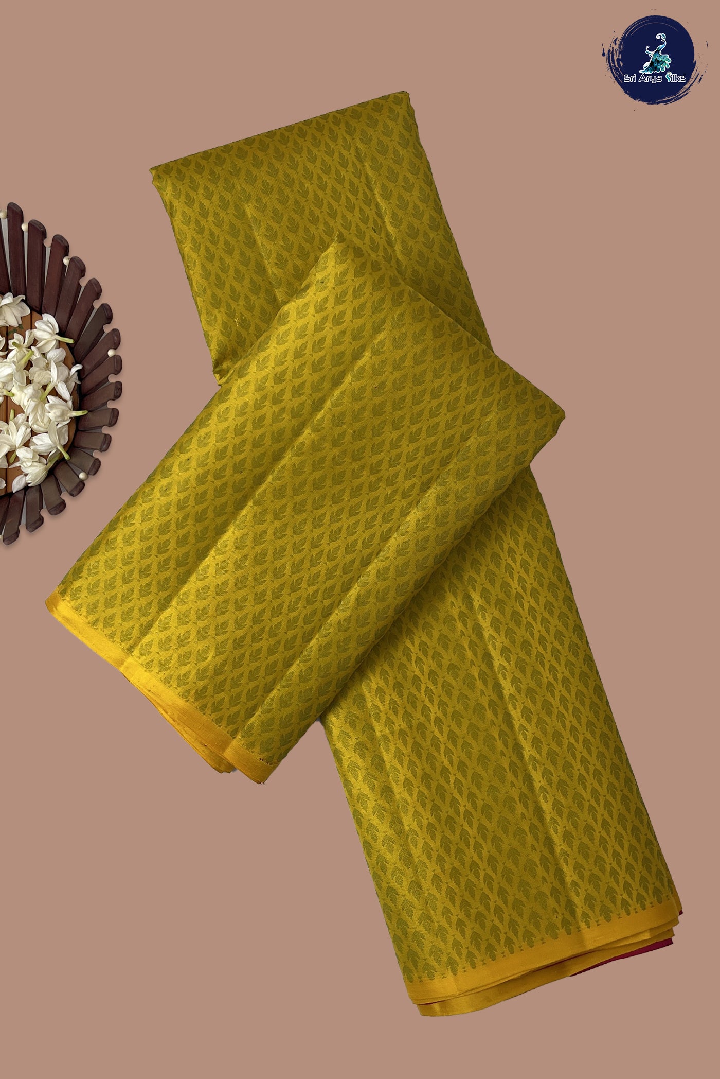 Yellow Brocade Silk Saree With Embossed Pattern