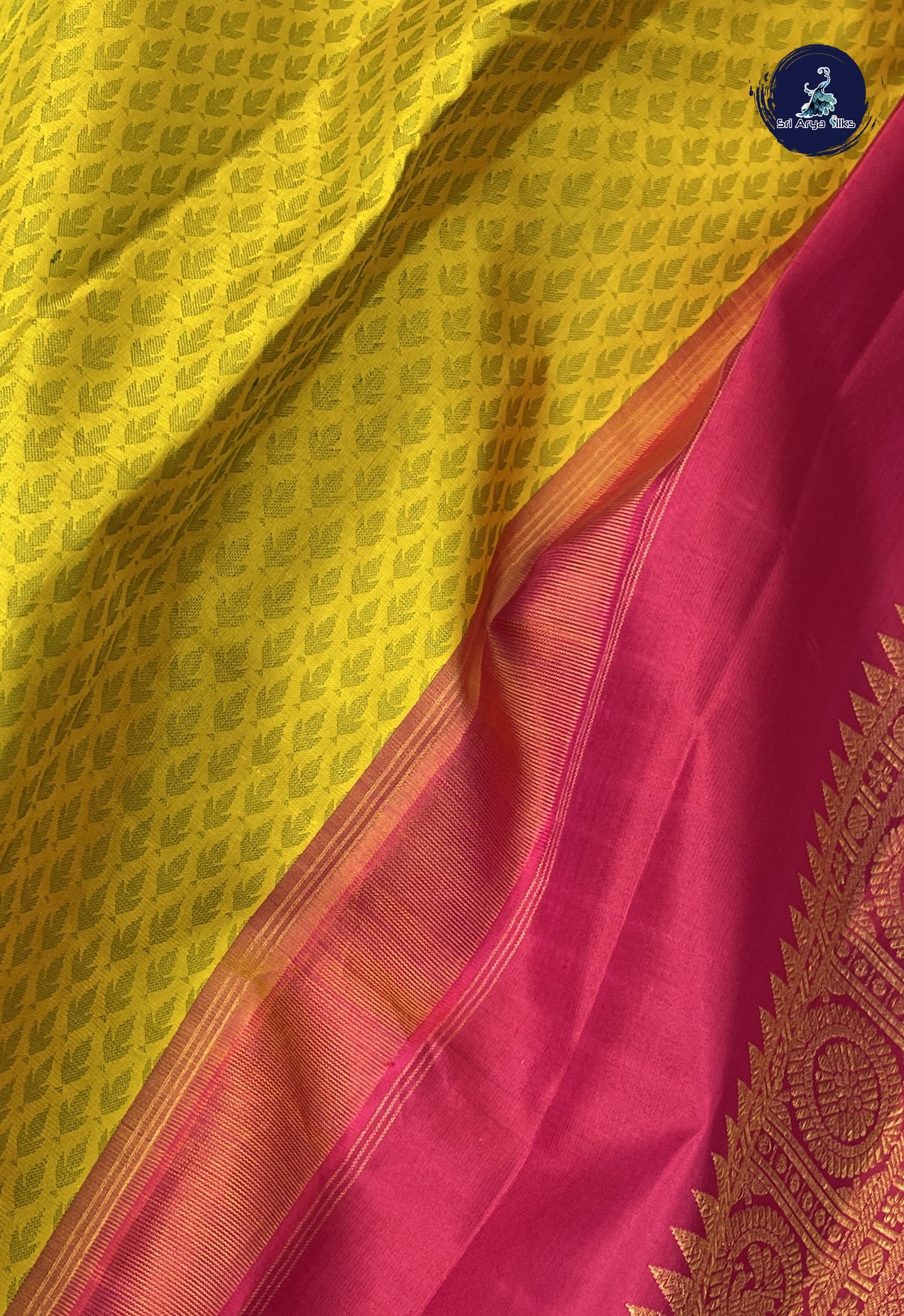 Yellow Brocade Silk Saree With Embossed Pattern