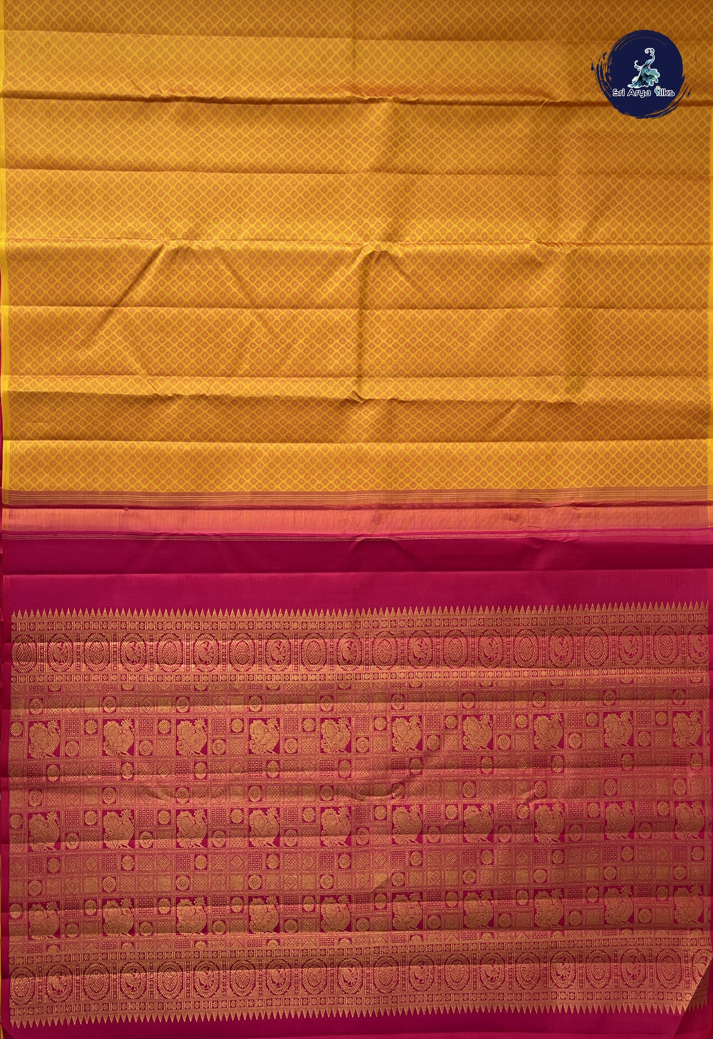 Mustard Yellow Brocade Silk Saree With Embossed Pattern