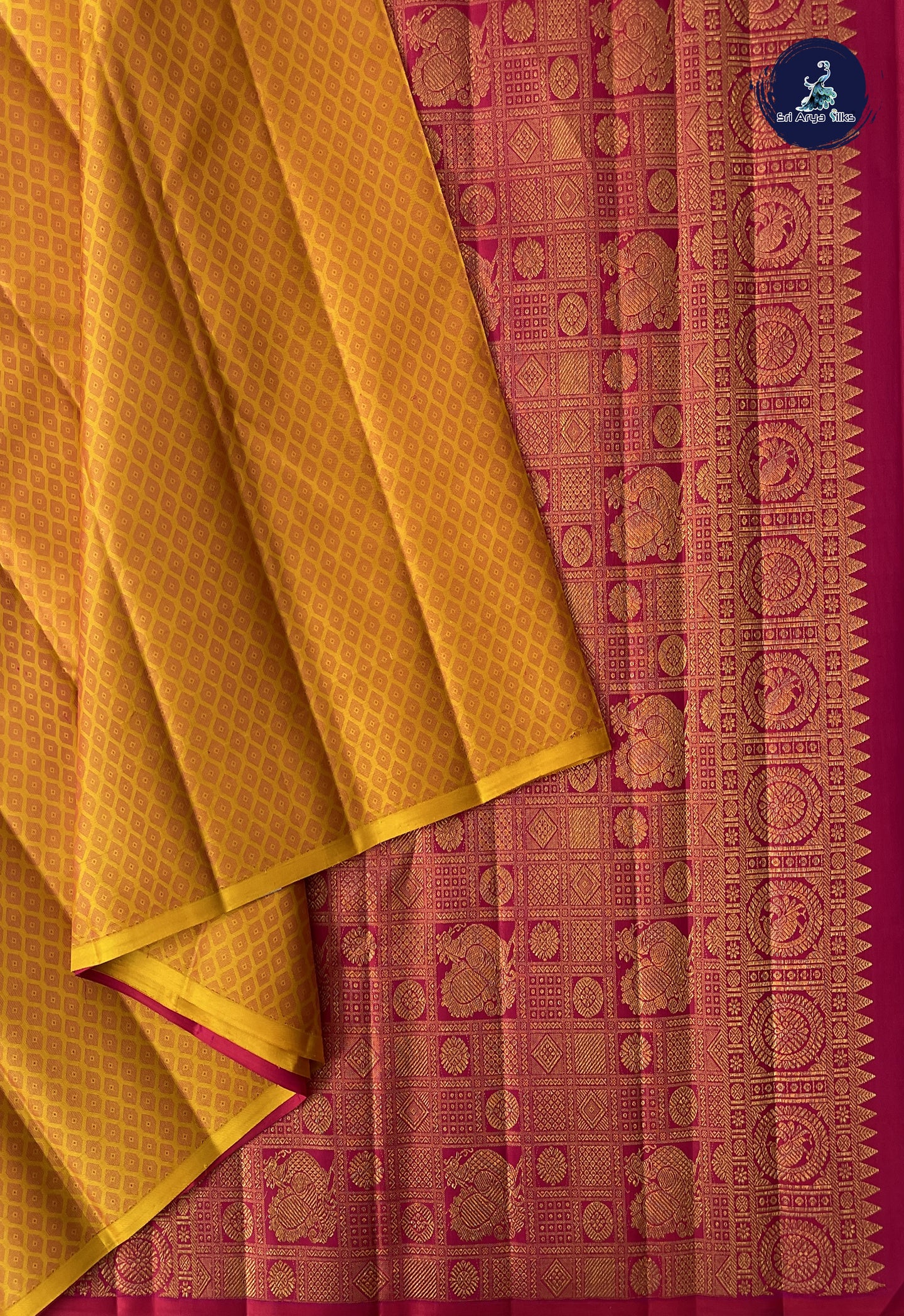 Mustard Yellow Brocade Silk Saree With Embossed Pattern