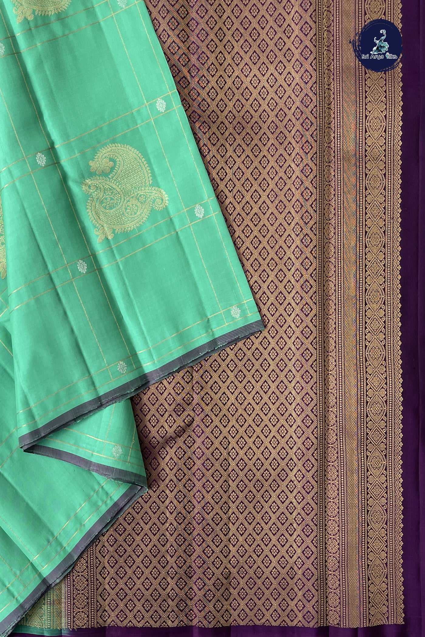 Sea Green Soft Silk Saree With Zari Checked Pattern