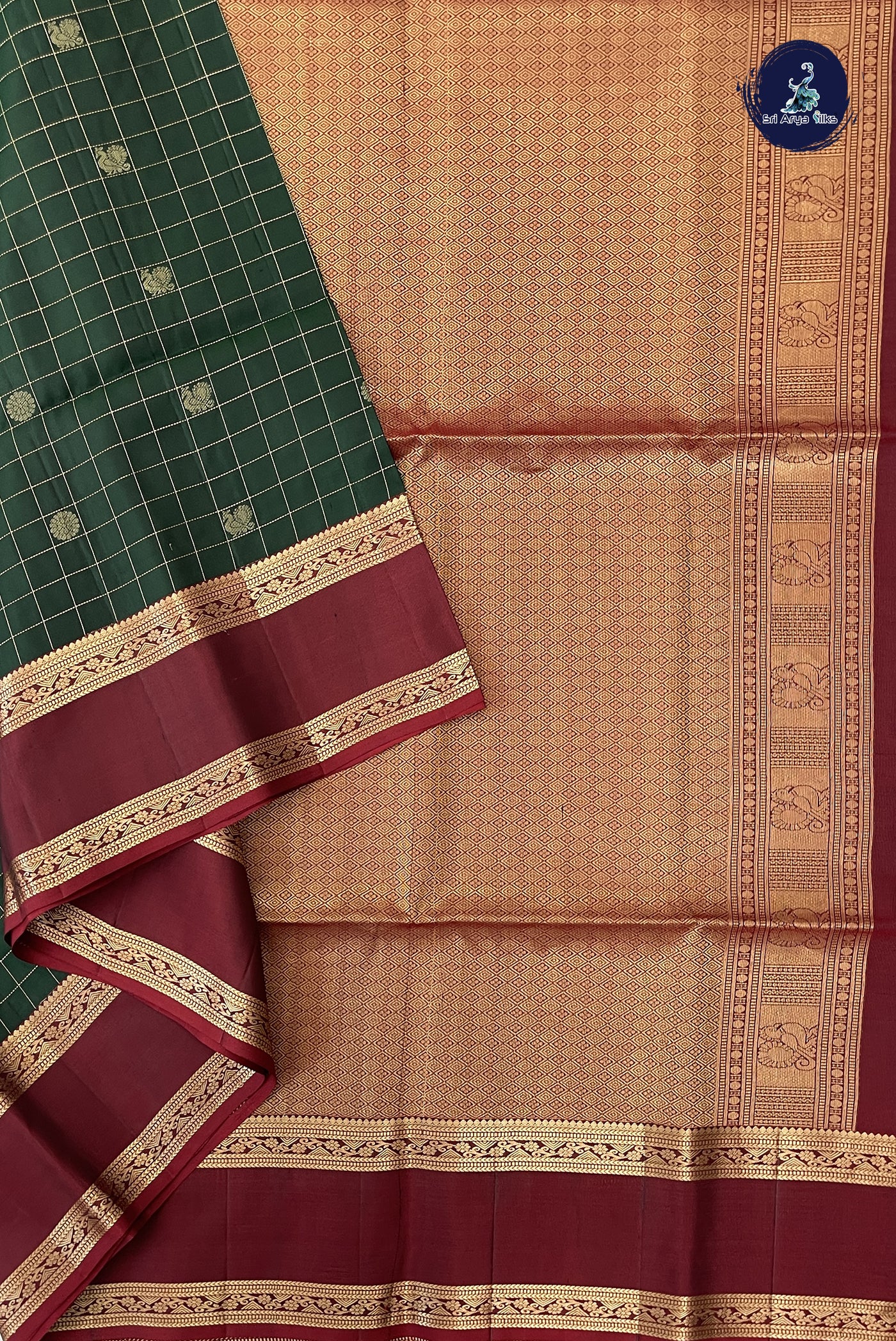 Bottle Green Soft Silk Saree With Zari Checked Pattern