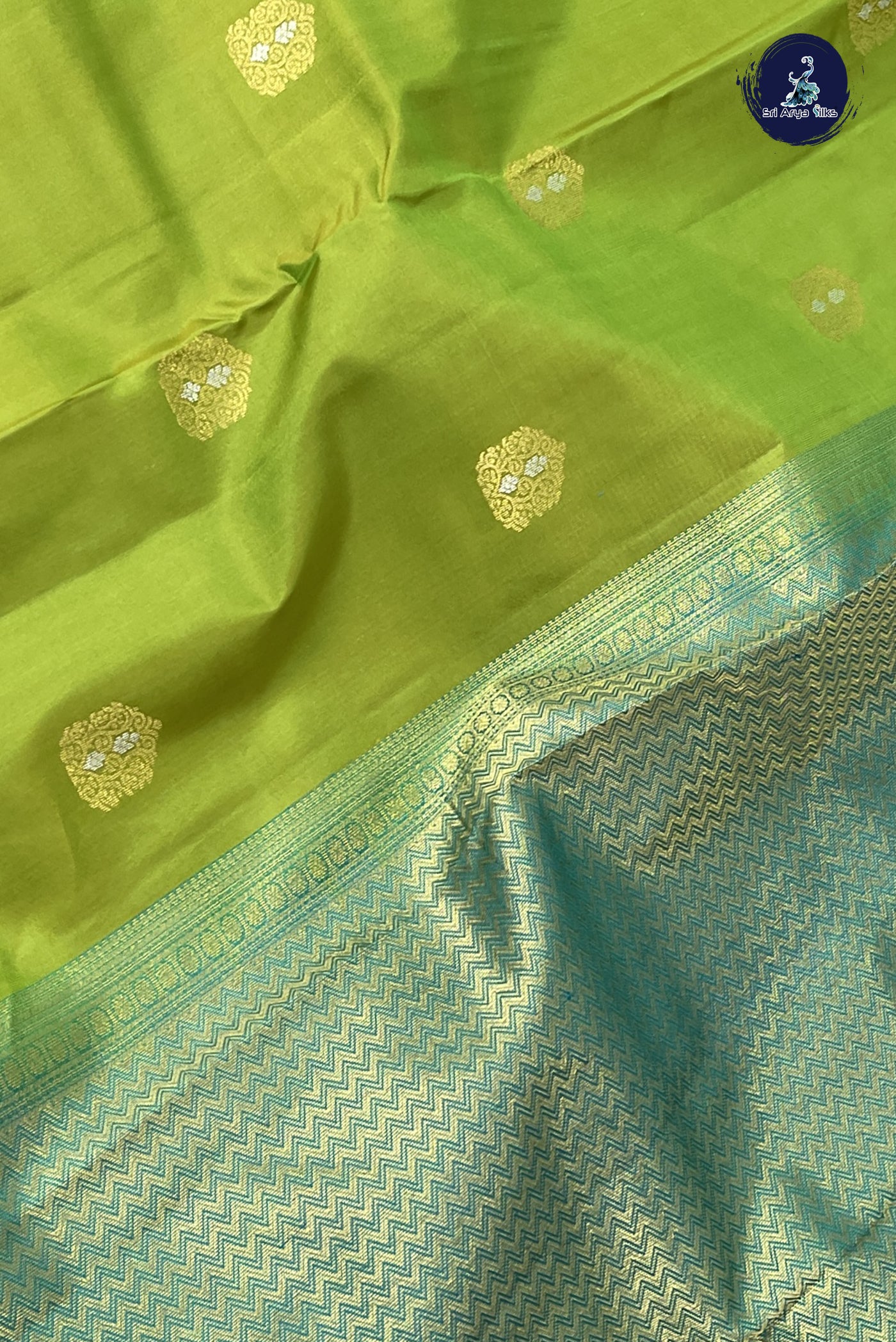 Dual Tone Green Korvai Contrast Silk Saree With Zari Buttas Pattern