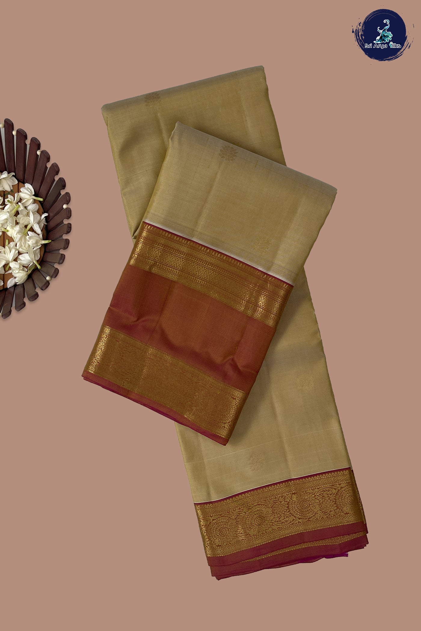 Creamish Yellow Traditional Silk Saree With Zari Buttas Pattern